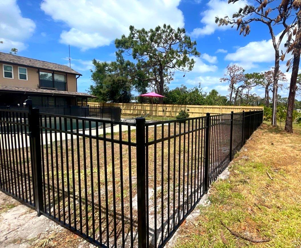 Black Aluminum 3 Rail Fence and Treated Wood Board on Board Privacy Fence  by Asap fence and gates, LLC