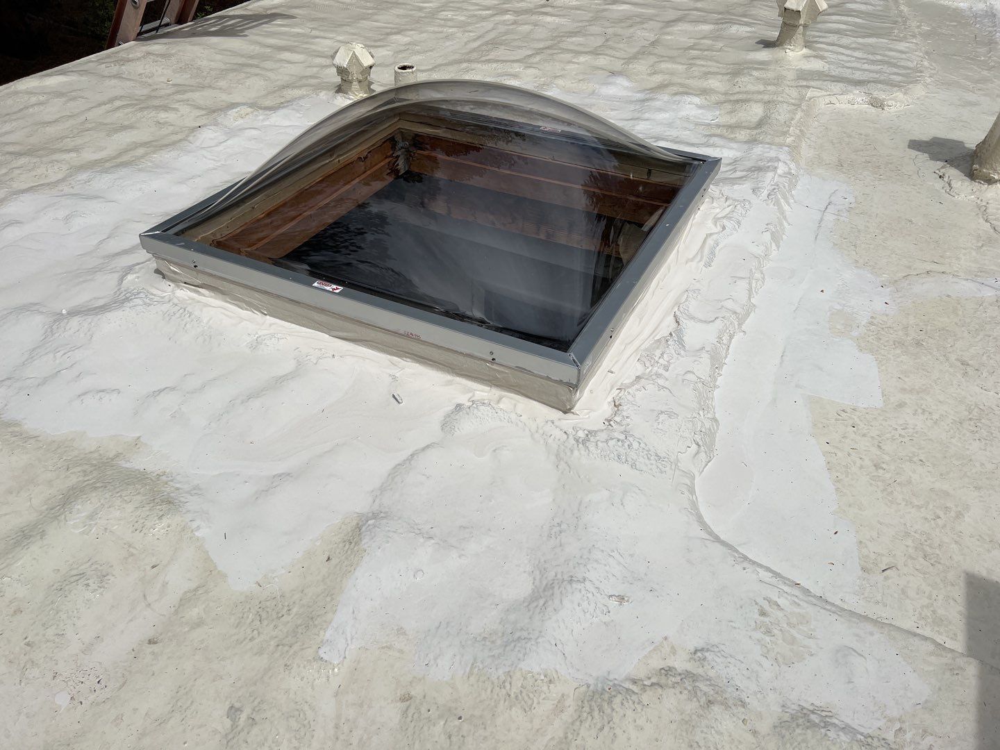 Commercial Roofing Installation using CASTAGRA ECODUR COATING by A to Z Roofing