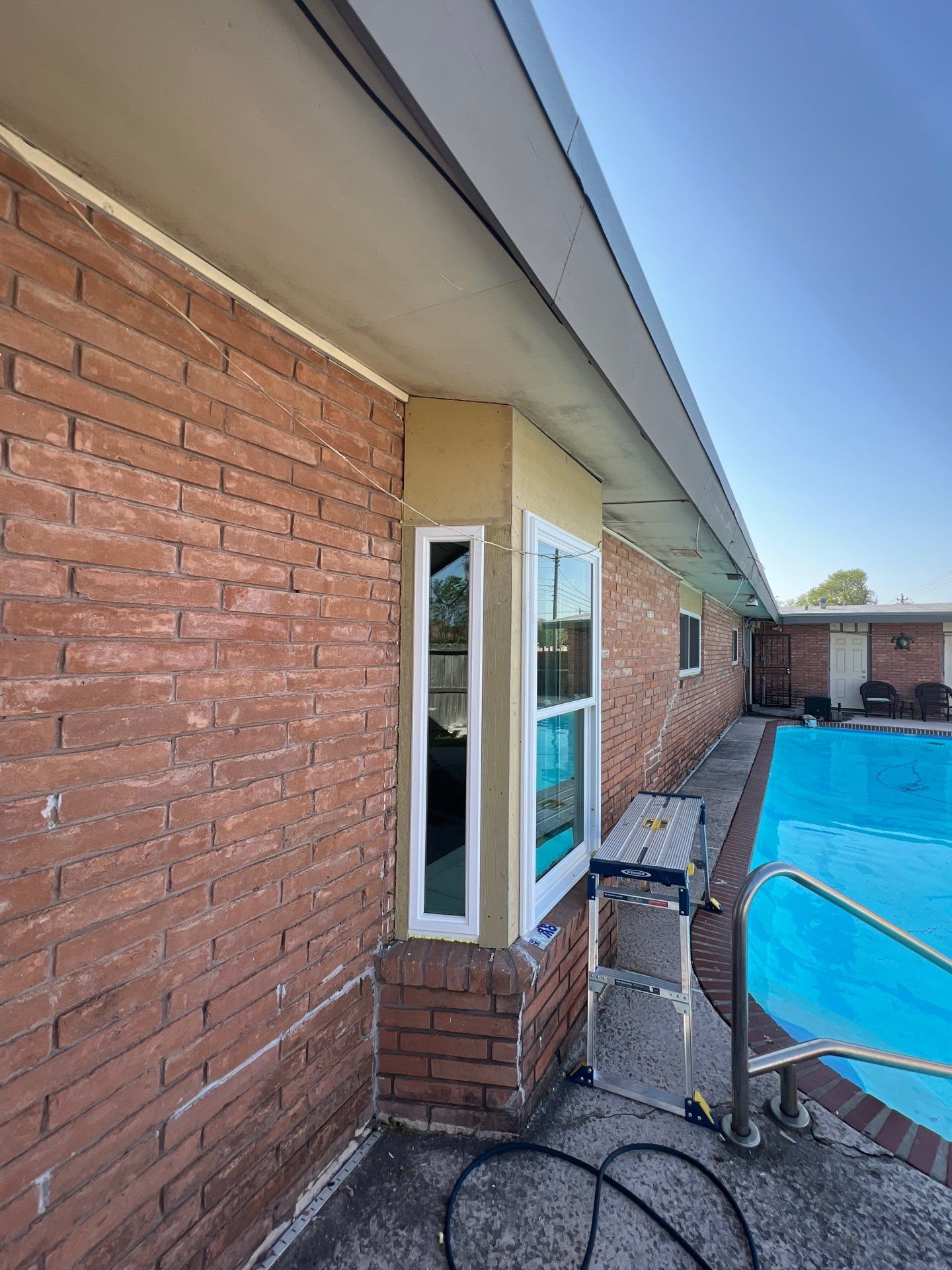 Windows in Brick with a Bay Window by Bayfront Roofing and Construction