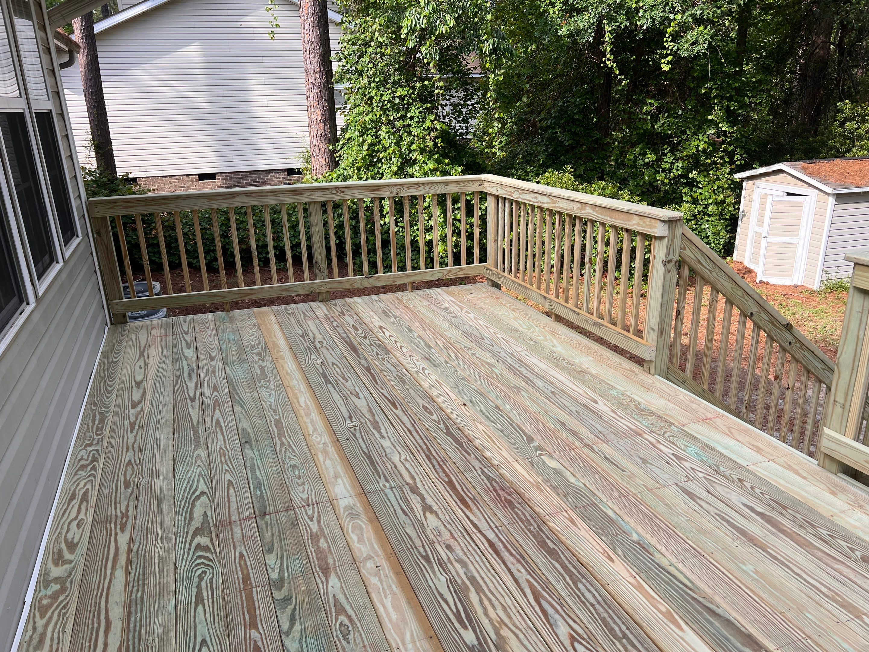 Pressure-Treated Wood Deck Resurface and Stair Replacement in Sanford by The Remodeling Company