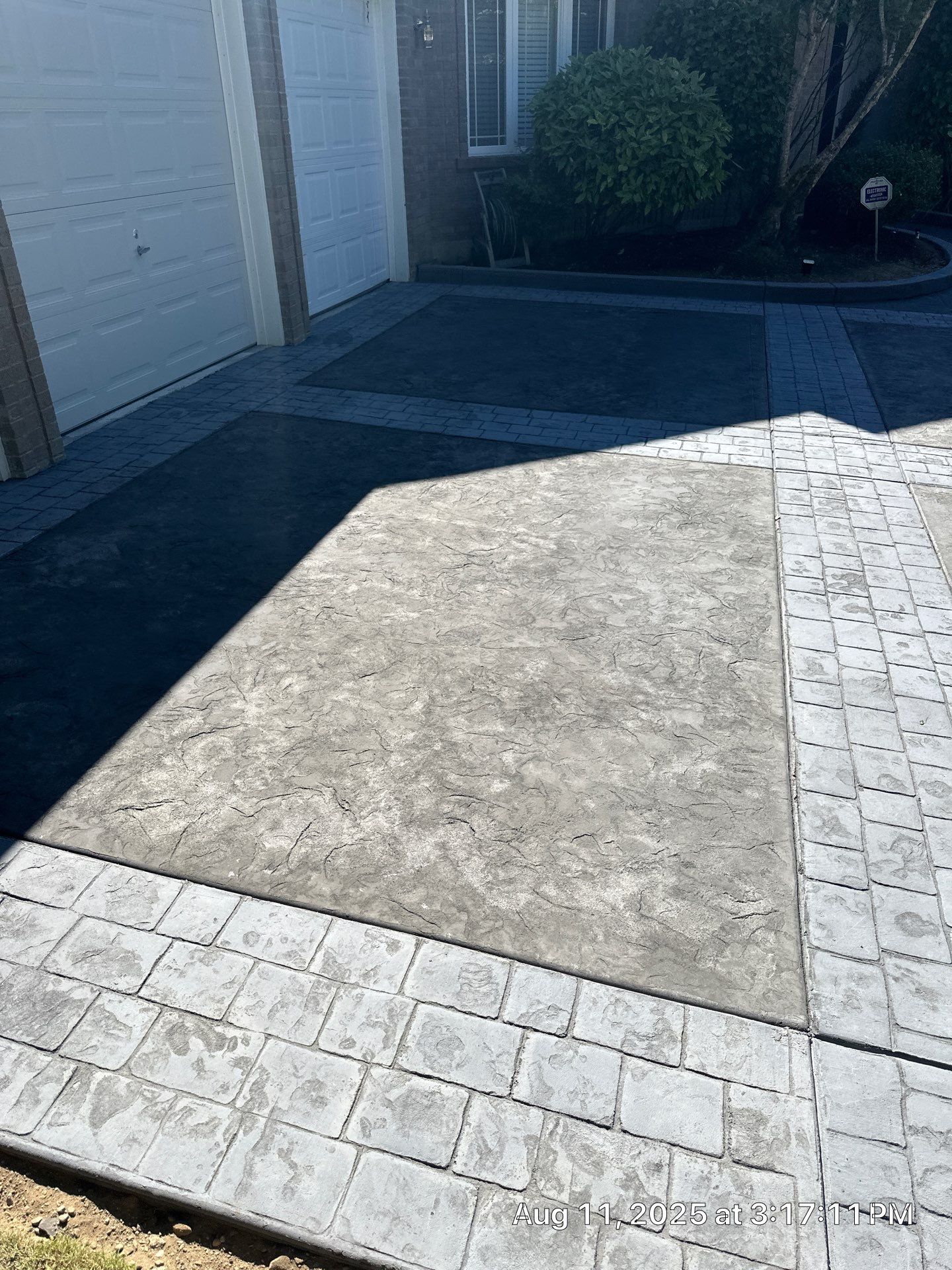 Multi-color Stamped & Sealed Concrete Driveway Renovation | Mukilteo by Jireh Asphalt & Concrete Inc