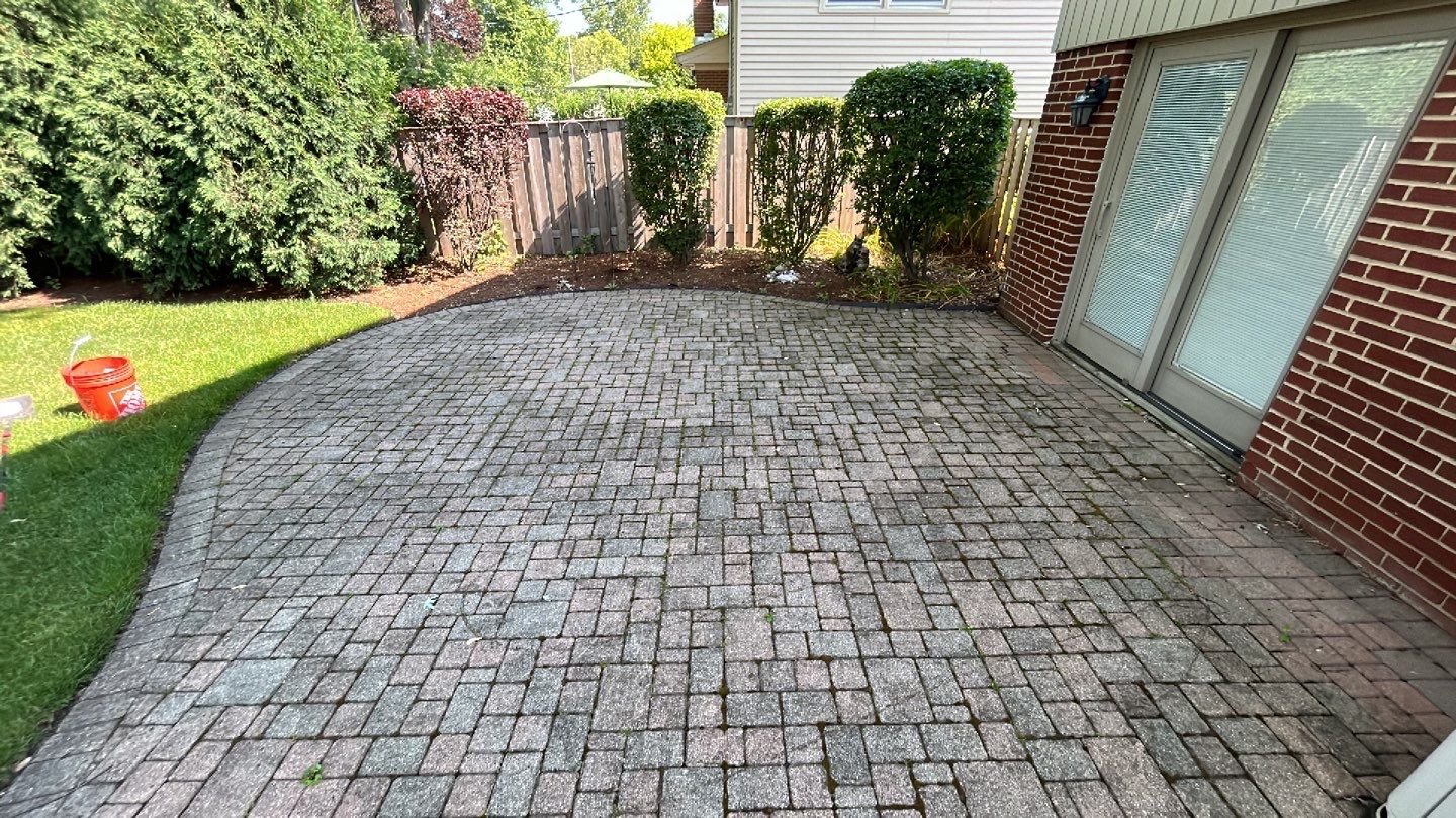 Brick paver clean, sand and seal. using Algaecide, soft wash soap by Northern Power Washing LLC.