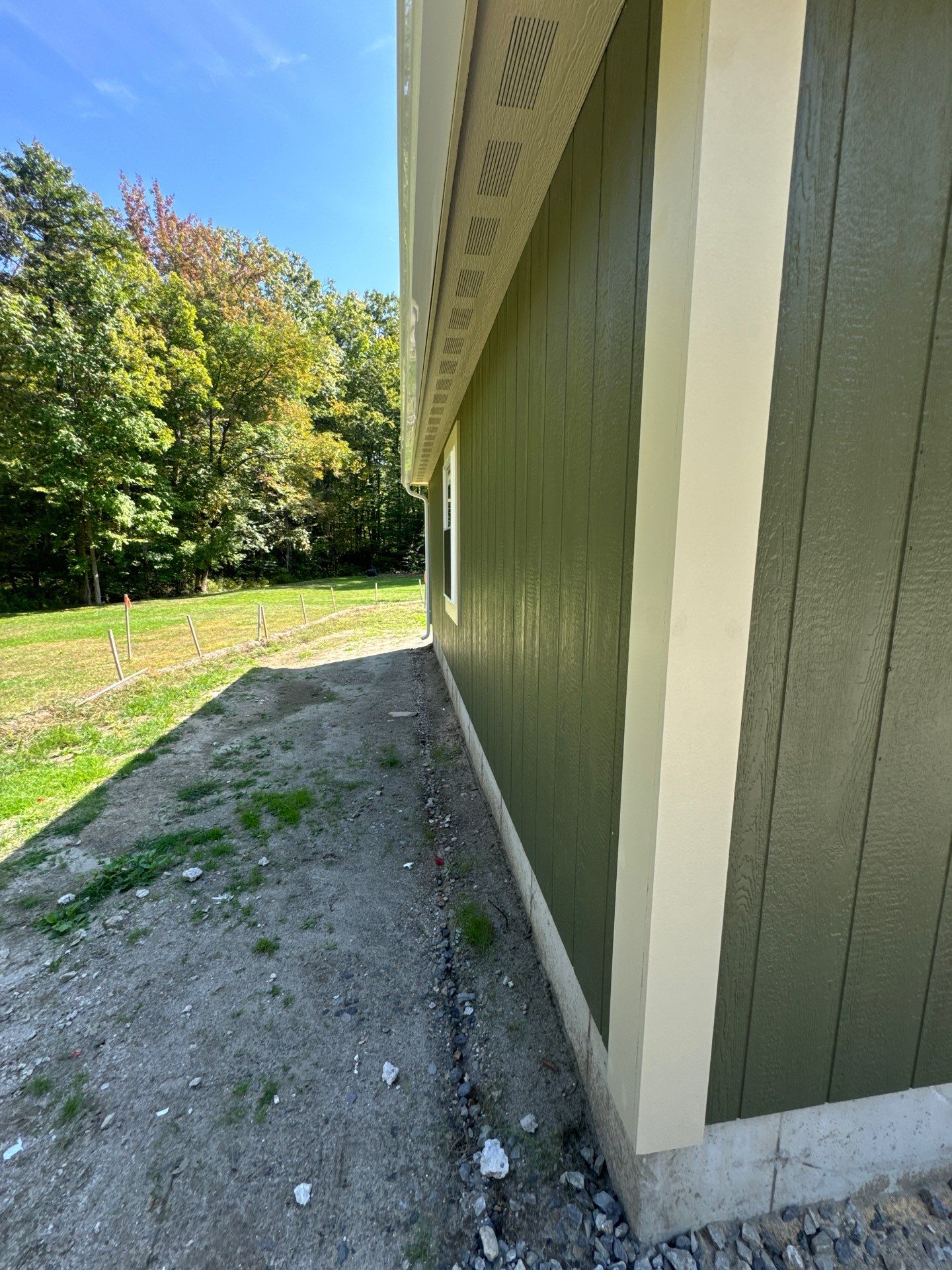 Two-Car Garage using LP SmartSide Panel Siding by Chagnon Building & Remodeling LLC