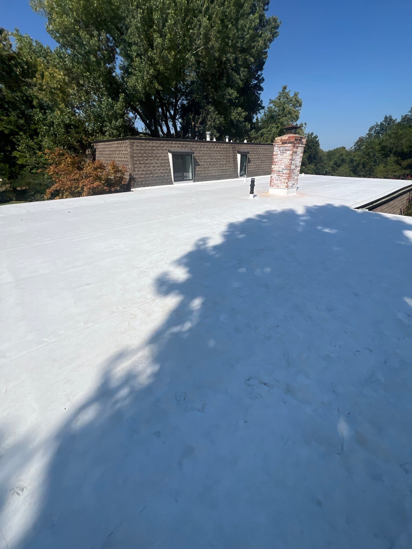 TPO Flat Roof Replacement in Edmond, OK by McCann's Roofing and Construction