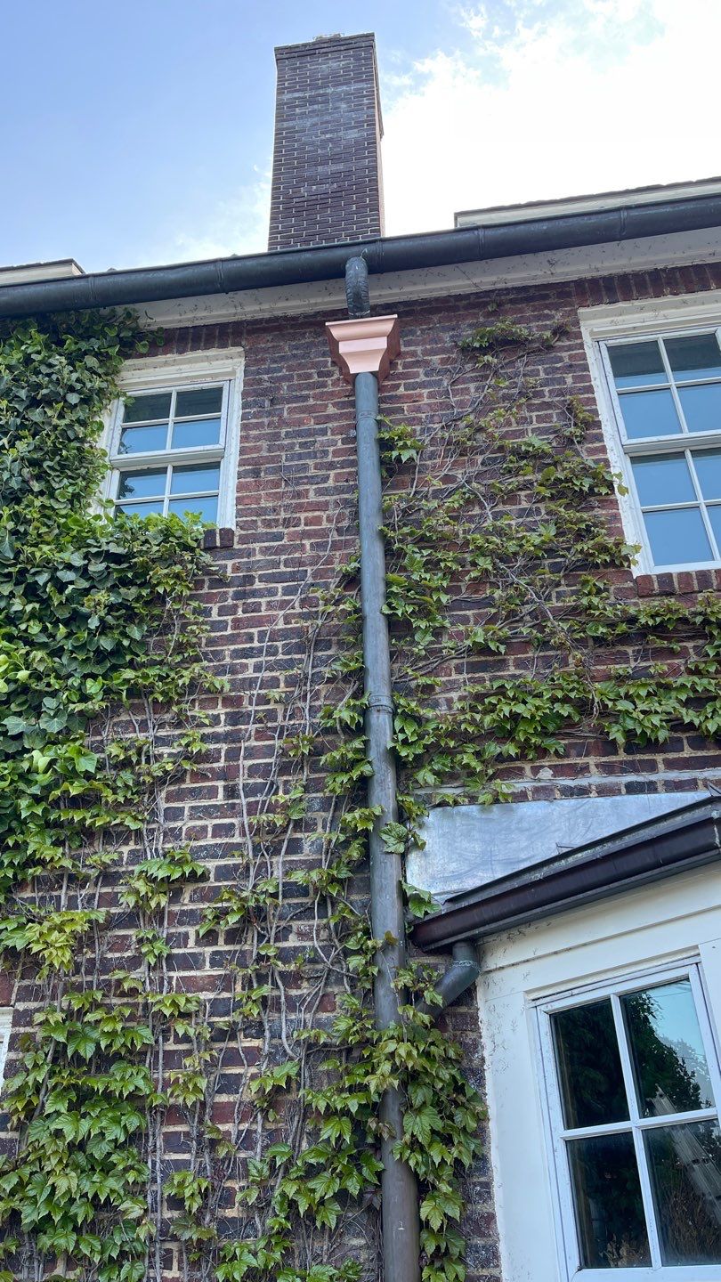 Copper Leader heads in Lawrence New York by Above All Gutters 
