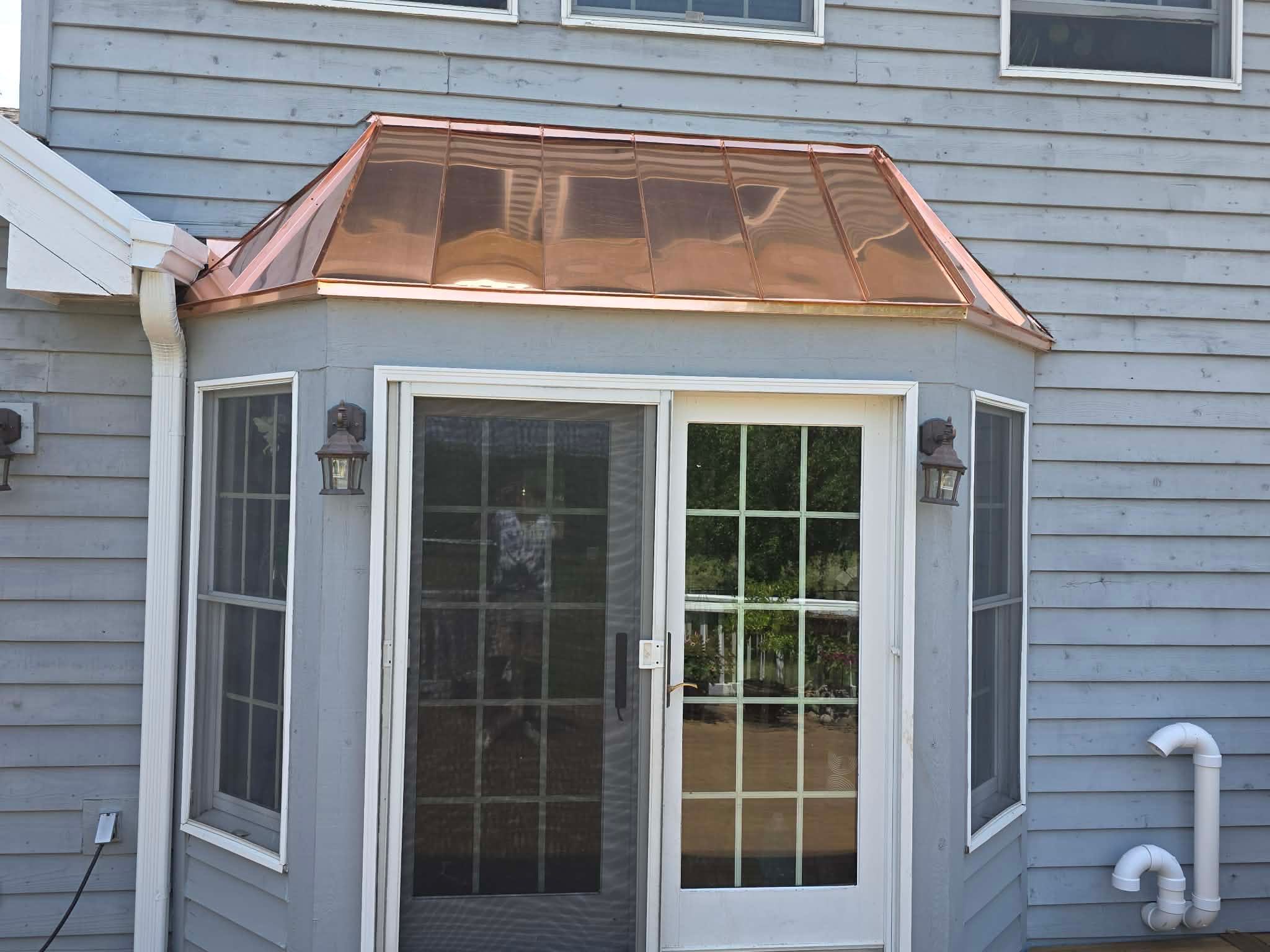 Roofing, copper chimney cap and copper awning by Optimal Home Improvement 