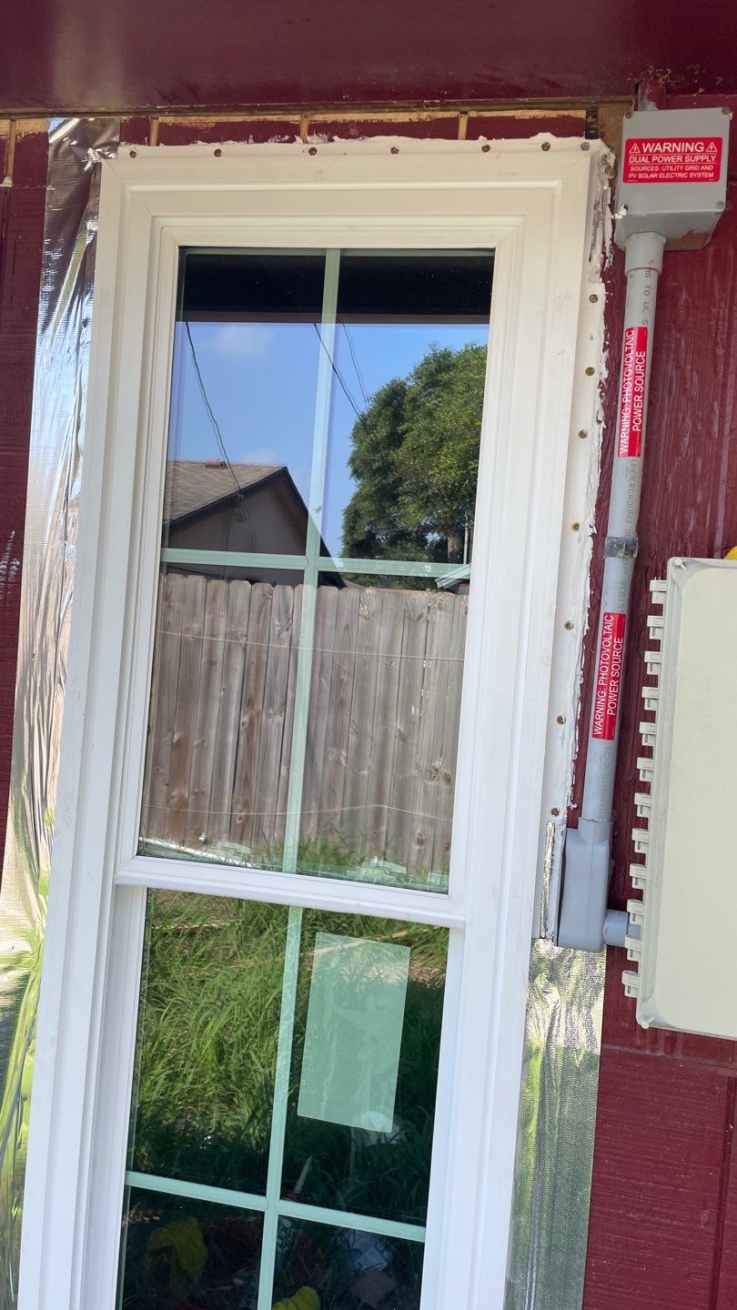 Black and white and red all over by Bayfront Roofing and Construction