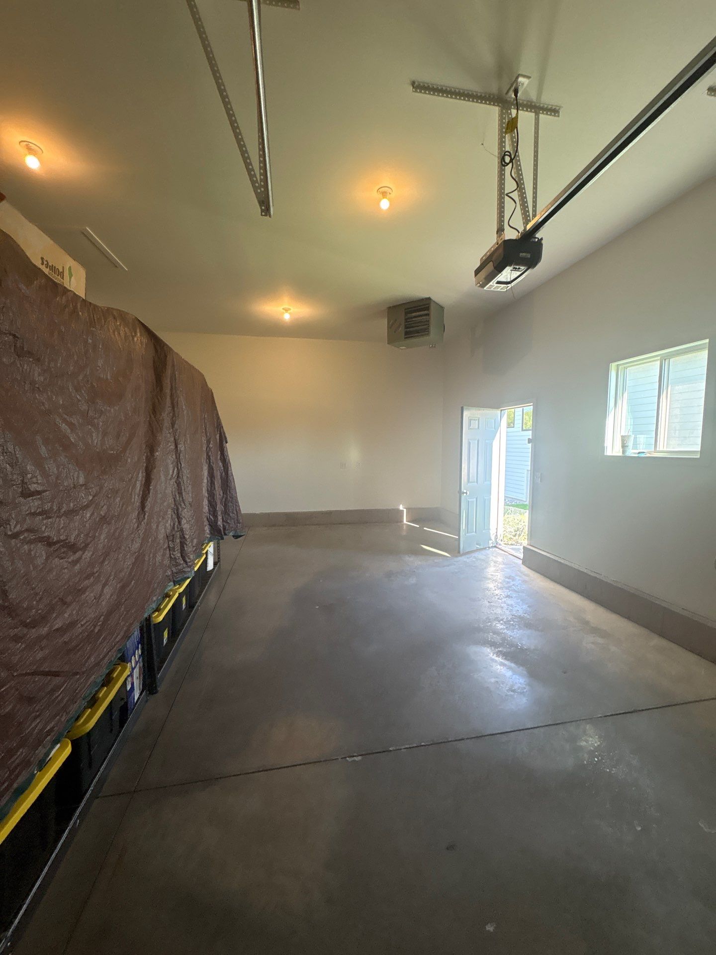 Full Garage Interior Drywall Finishing and Priming in Sioux Falls by Select Painting, Coatings & Garage Cabinets