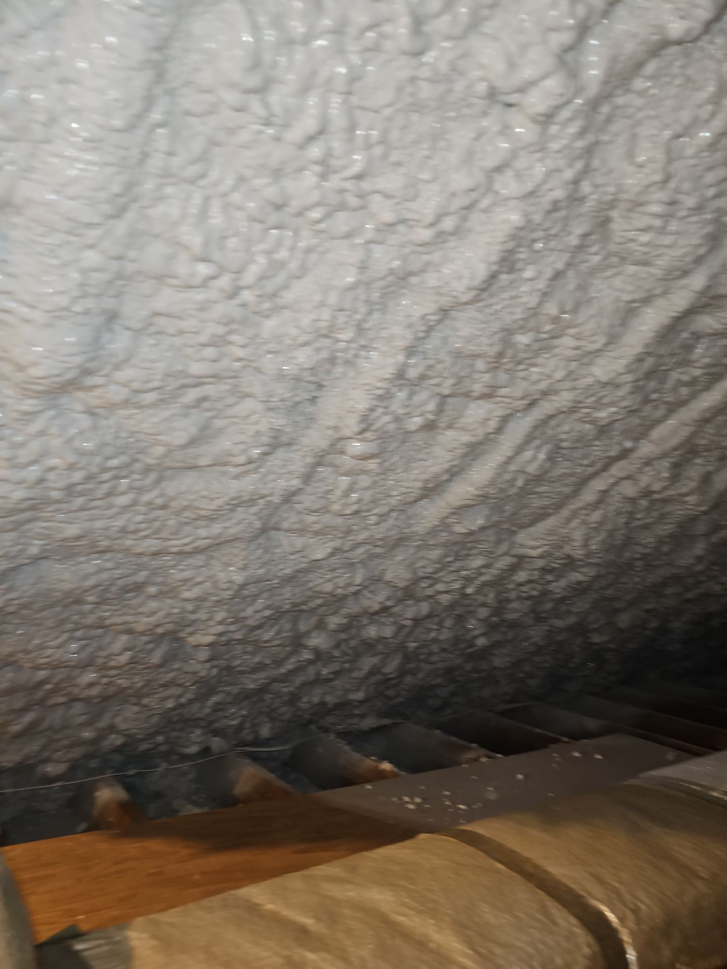 Attic Retrofit using open cell spray foam by NYS Foam & Energy