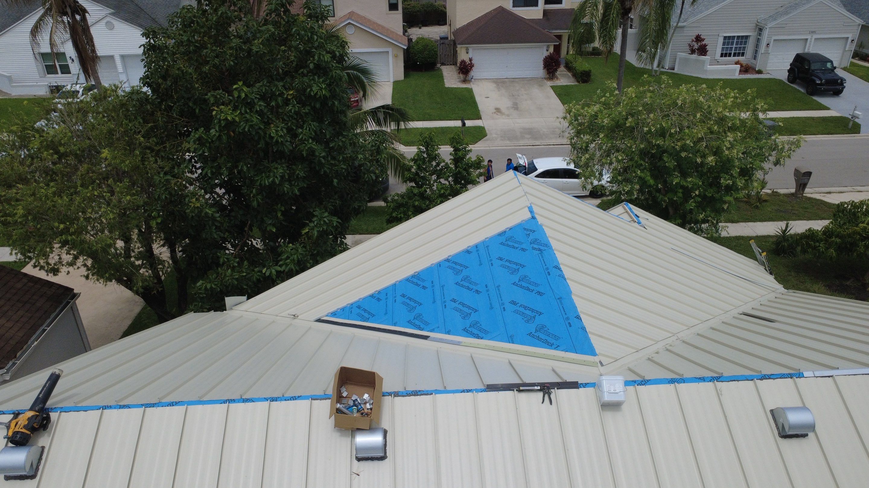 Residential Roofing Installation using 1.5'' Mechanical Seam by BLUES BROTHERS ROOFING