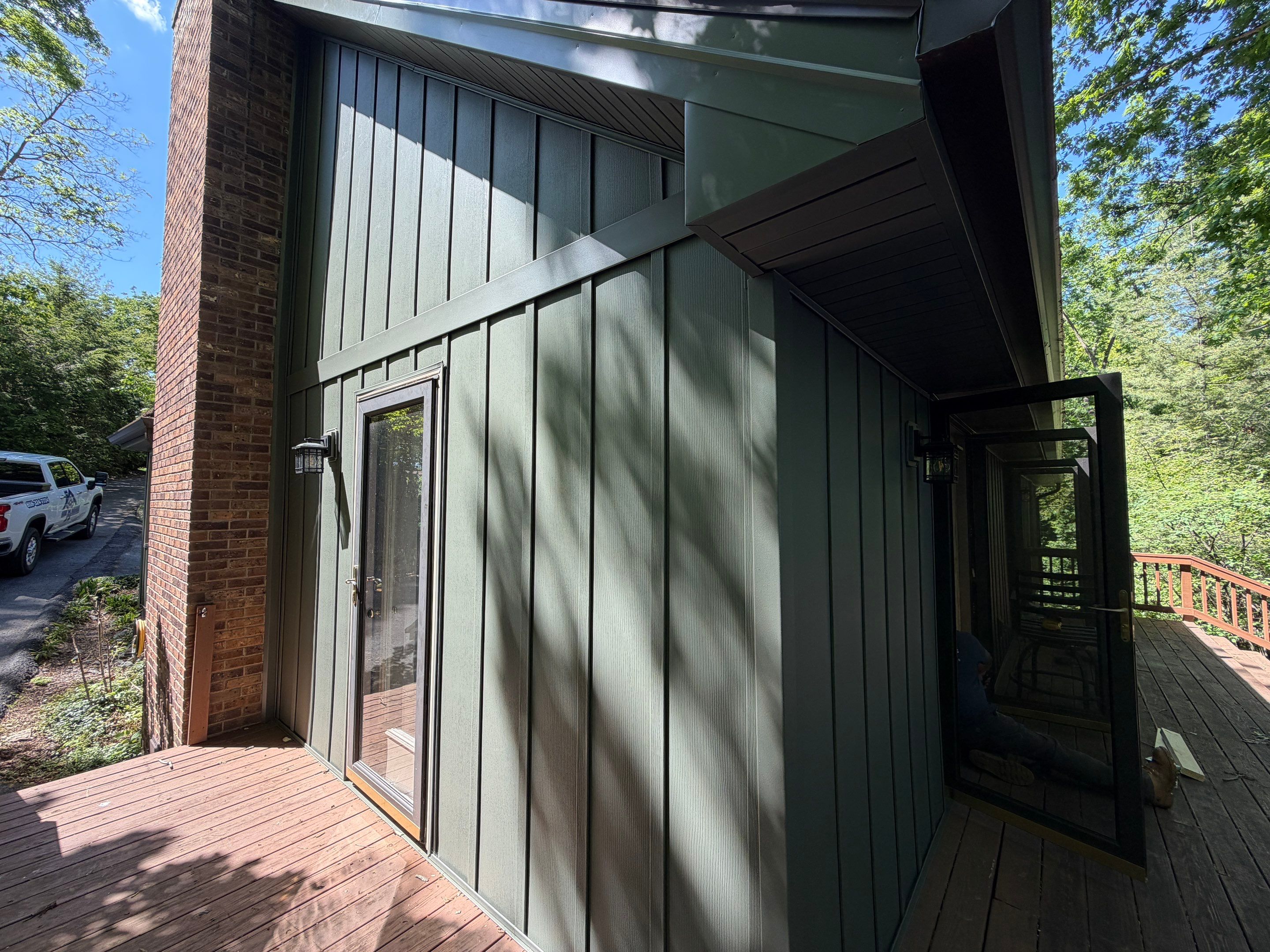 Deep Moss Board and Batten Siding Transformation in Danville by Stout Exteriors