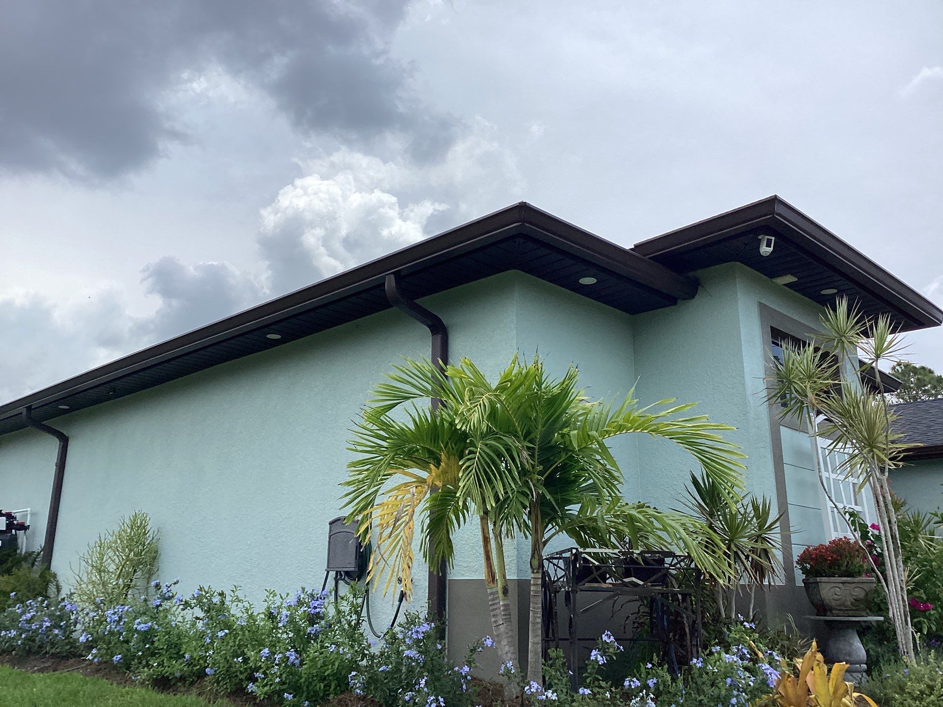 Musket Brown and New Downspouts in Lehigh Acres, FL  by Gutter Professors