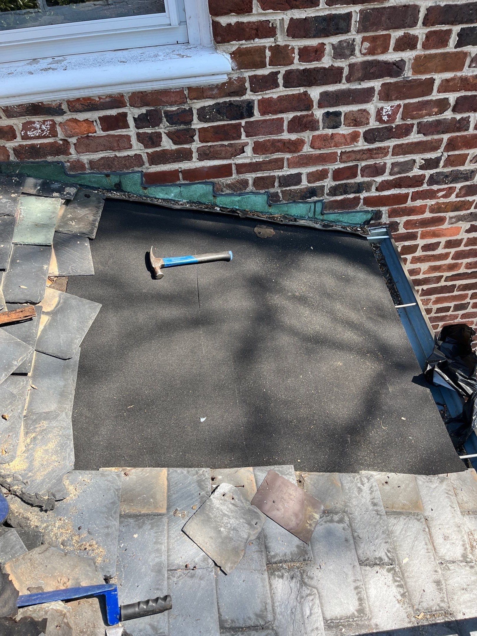 Slate Roof Restoration and Copper Ridge Cap Install in Richmond by Cade Construction