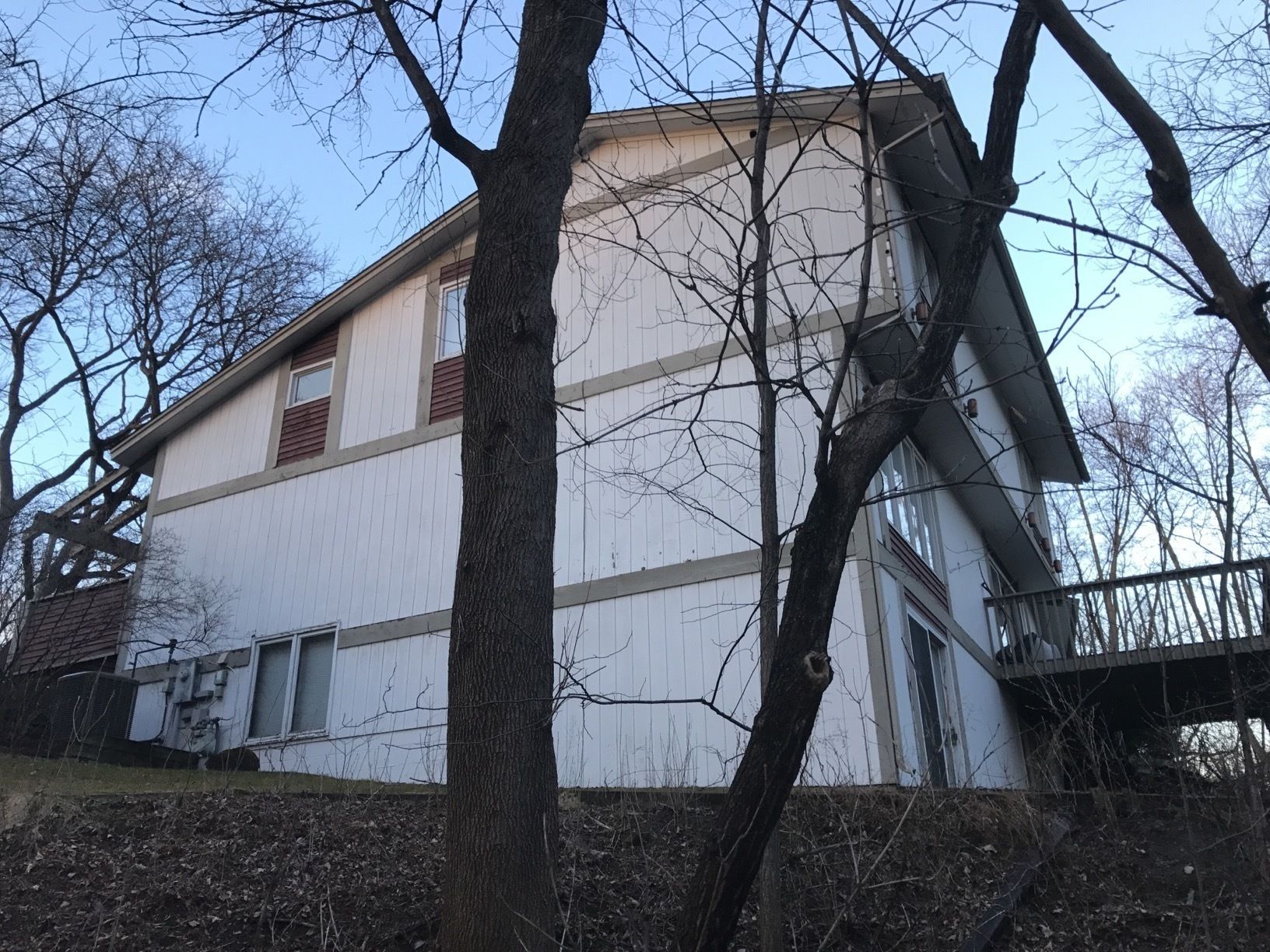Siding Installation using LP SmartSide and Pella Vinyl Windows by MODERN EXTERIOR SYSTEMS
