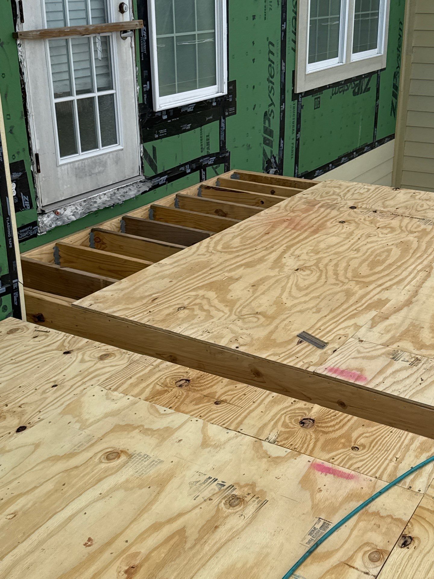 Walk Out Patio Cover by Bayfront Roofing and Construction