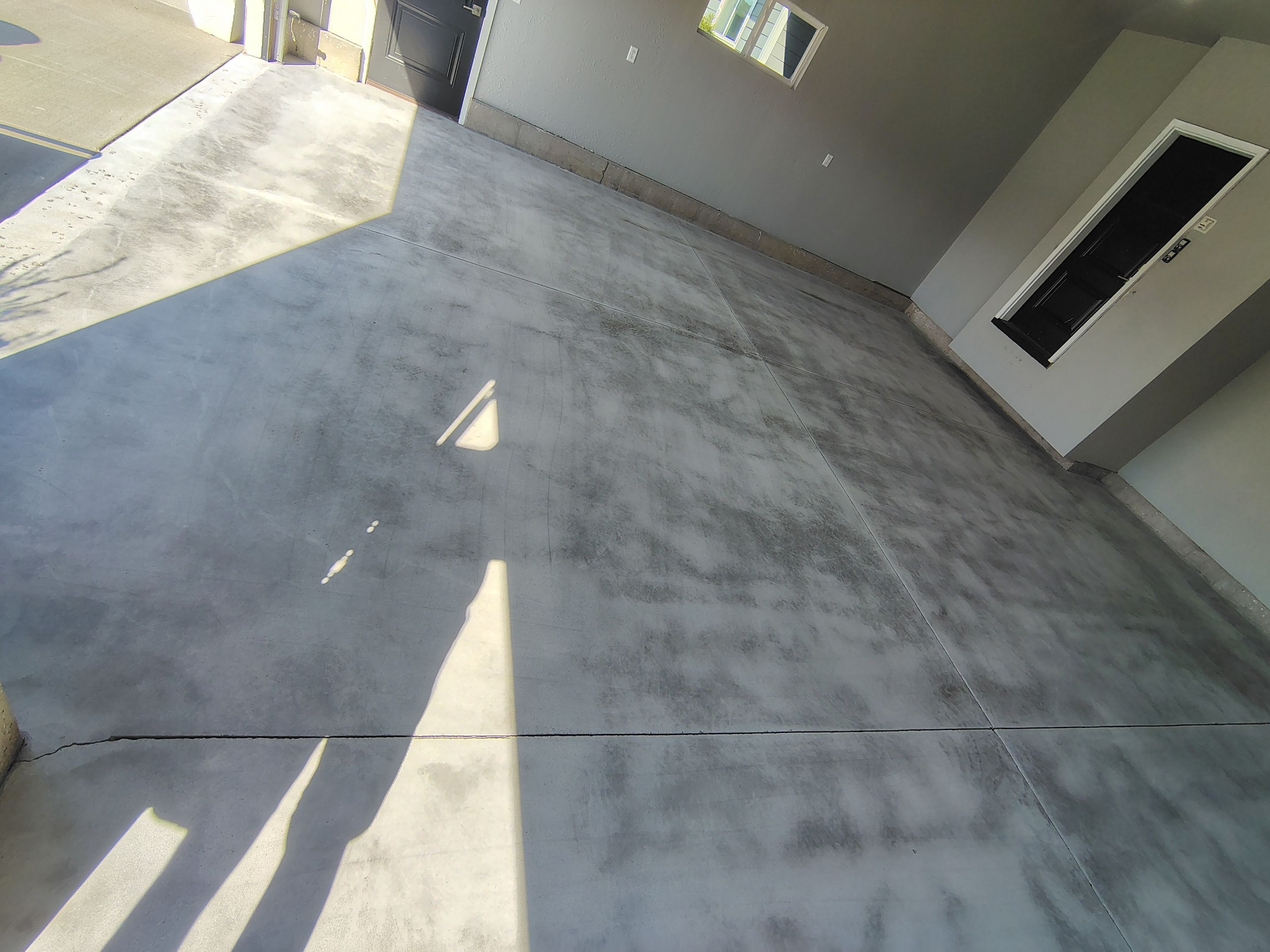 Custom Gray Flake Garage Floor Coating in Sioux Falls by Select Painting, Coatings & Garage Cabinets
