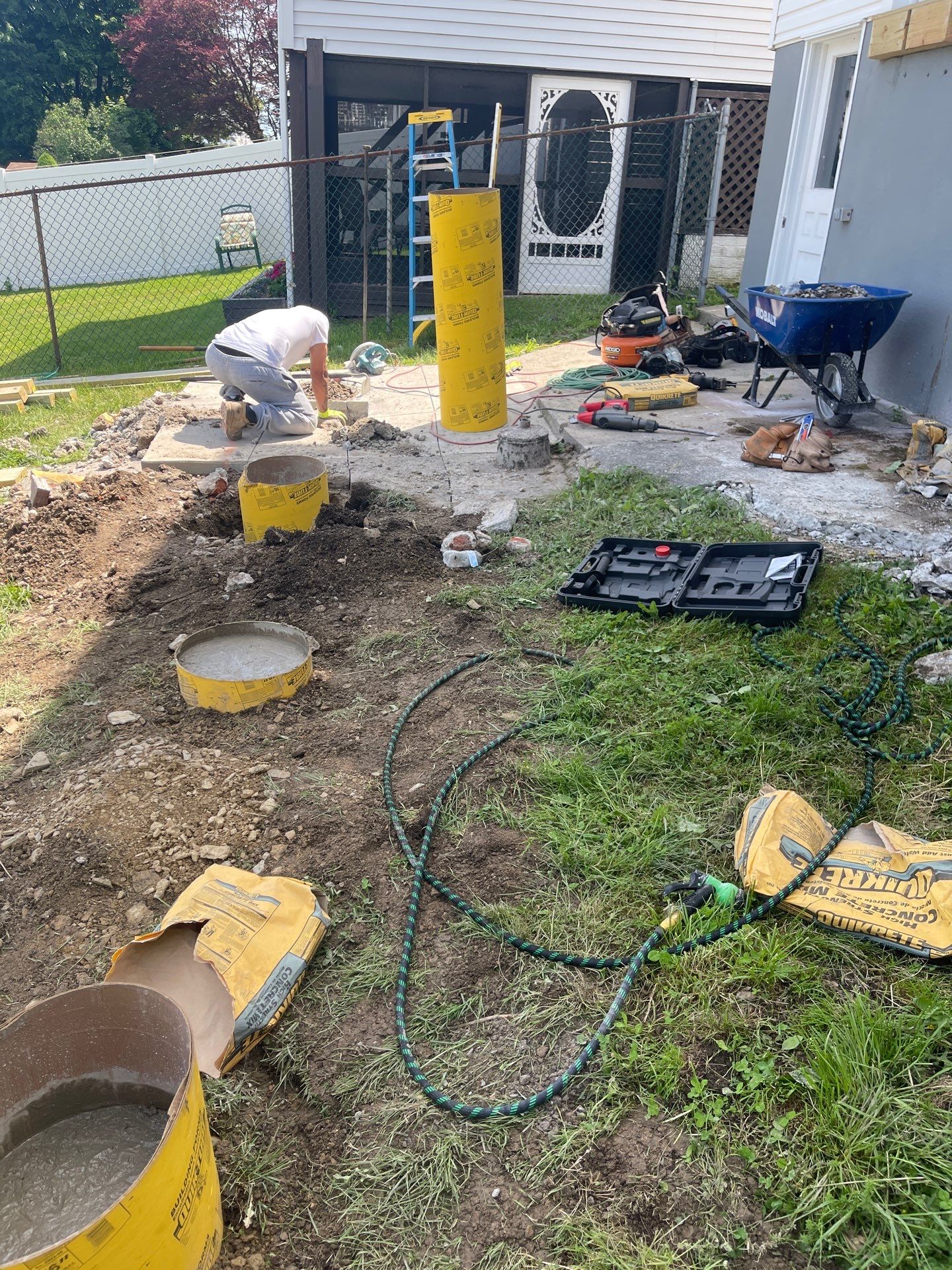 Pressure-Treated Wooden Staircase and Concrete Footing Installation in Schuylkill Haven by Herts Roofing & Construction
