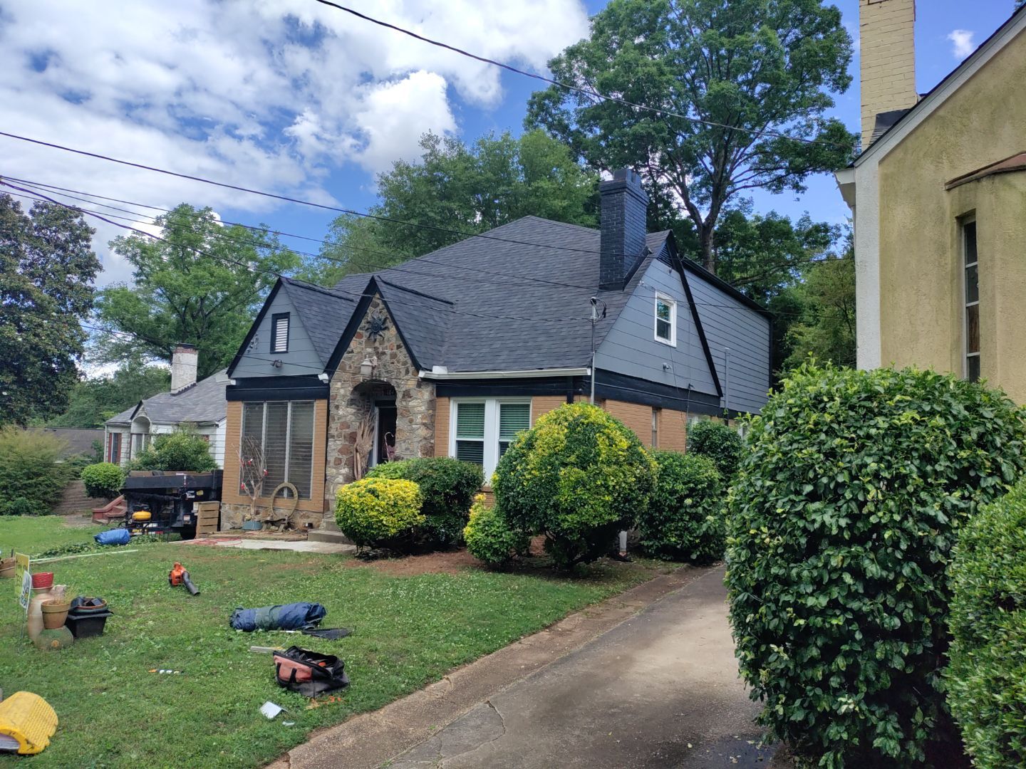 Residential Roof Replacement using Owens Corning Trudef Twilight Black by Inspector Roofing and Restoration
