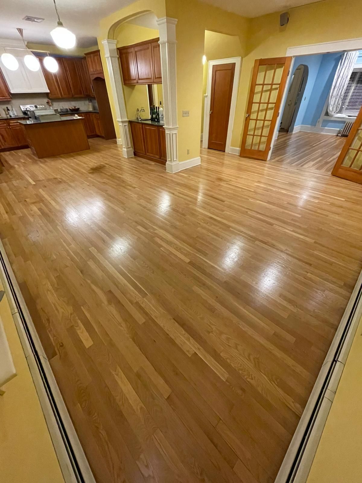 Hardwood floor repair and refinish using Duraseal Natural Stain with Semi Gloss Finish by Footprints Floors Morristown