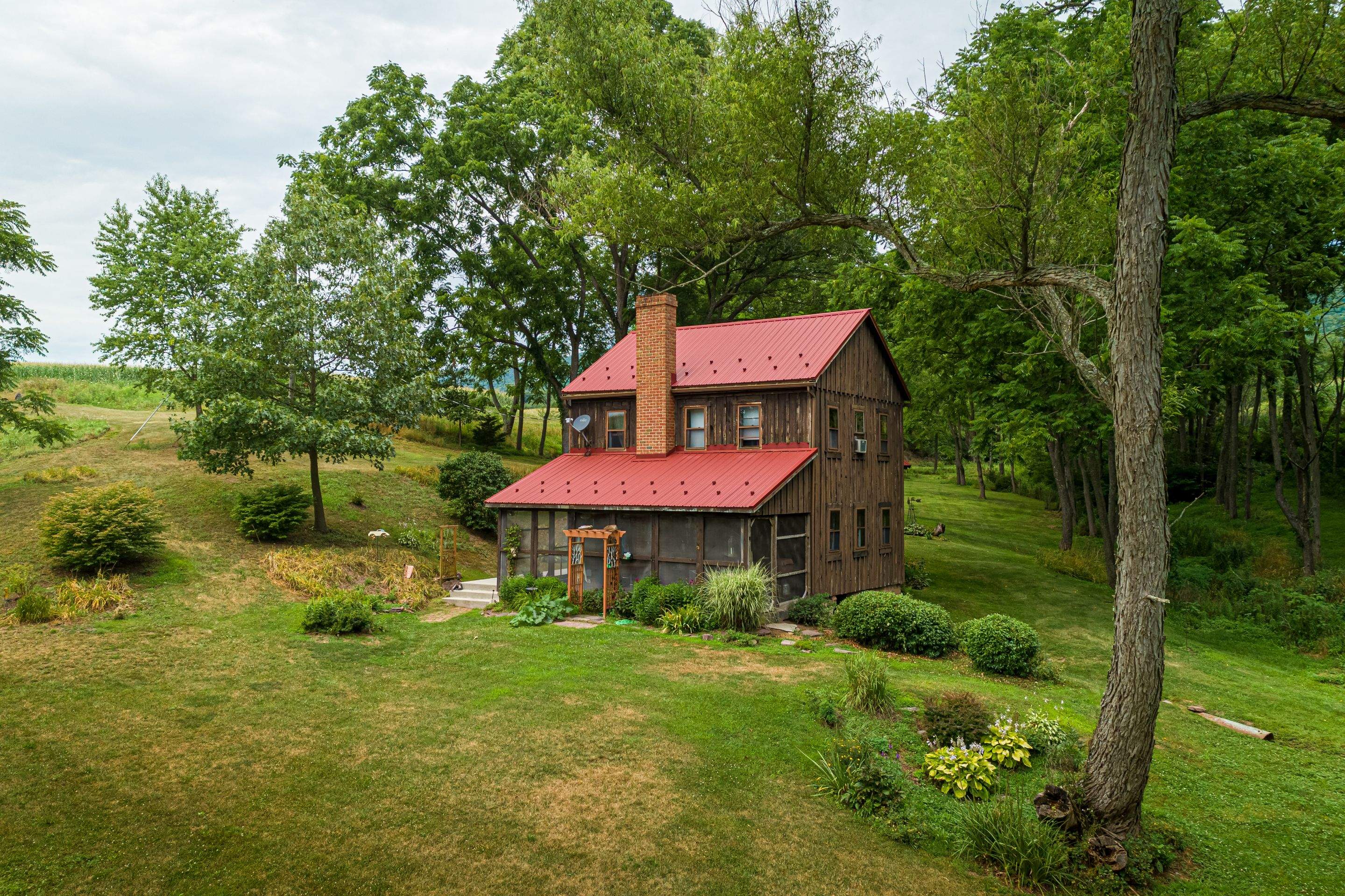 Metal Roof-colonial red by Esh Builders