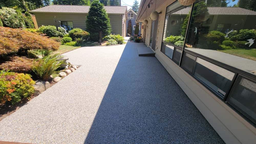 Monticello Sanctuary: A Patio of Refined Tranquility by Concrete Coating Experts Inc.