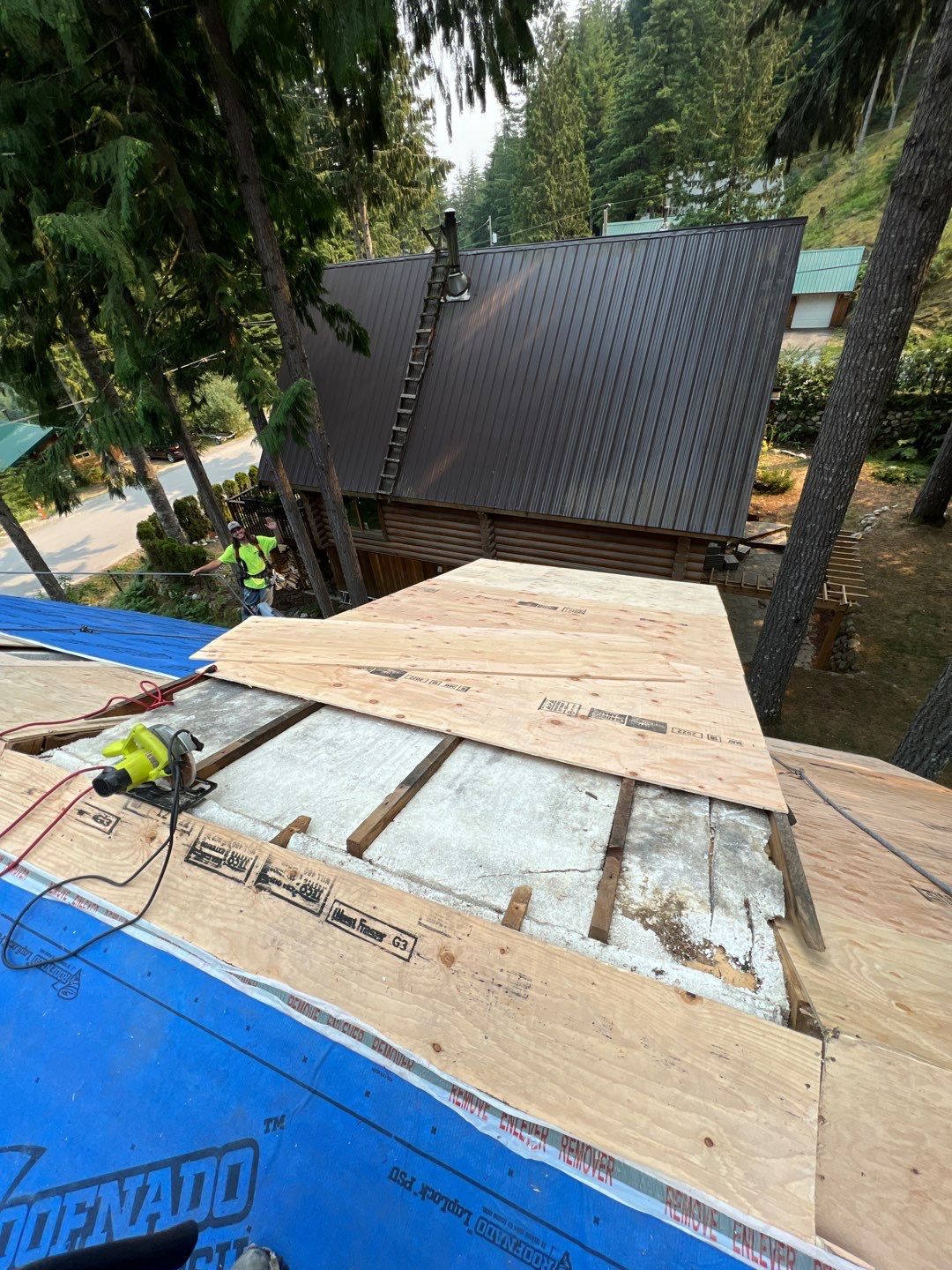 Residential ReRoofing Installation using 12" Prolok metal  by Top Notch Roofing Inc