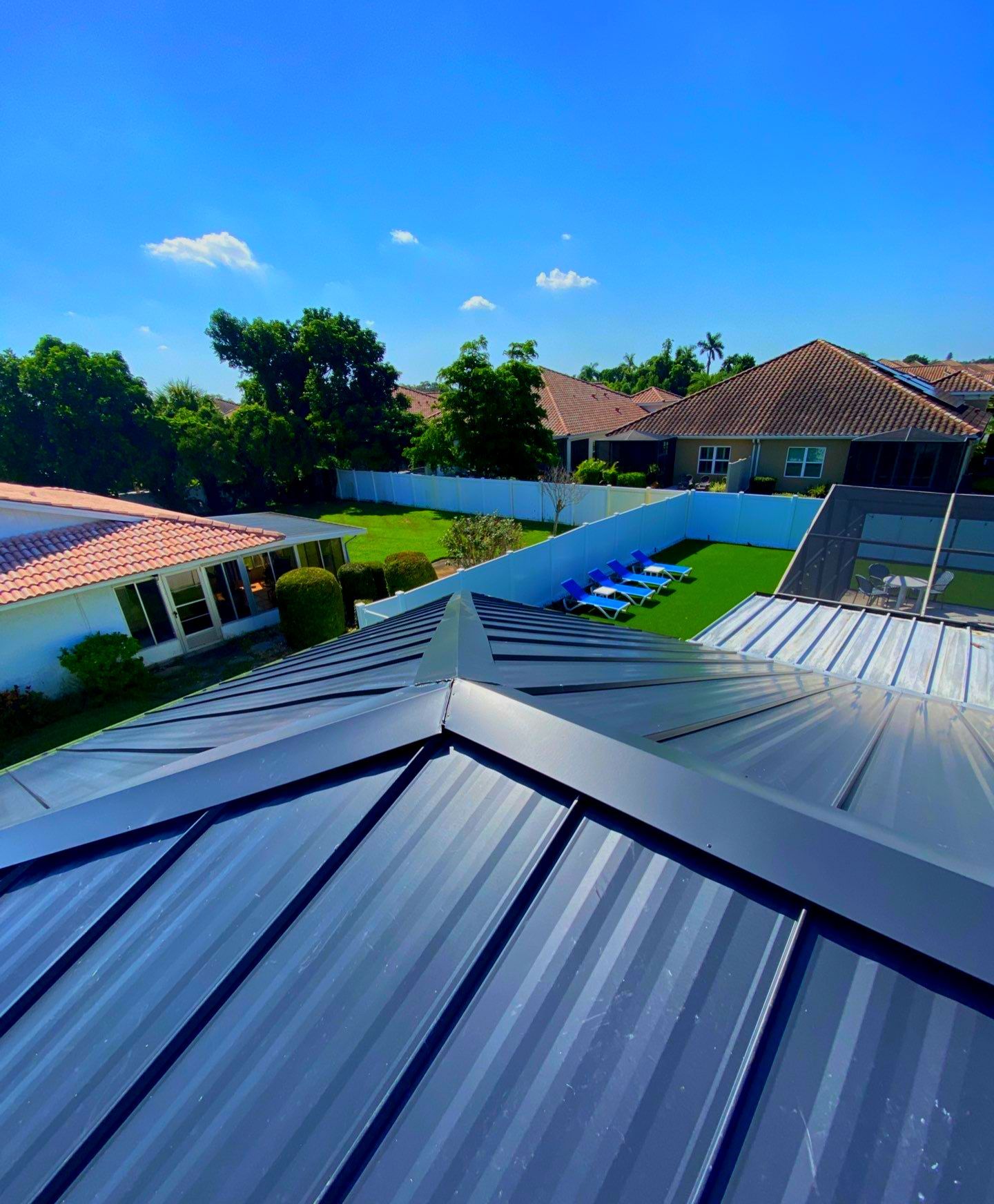 Metal Roofing System by Rooster Roofing, LLC