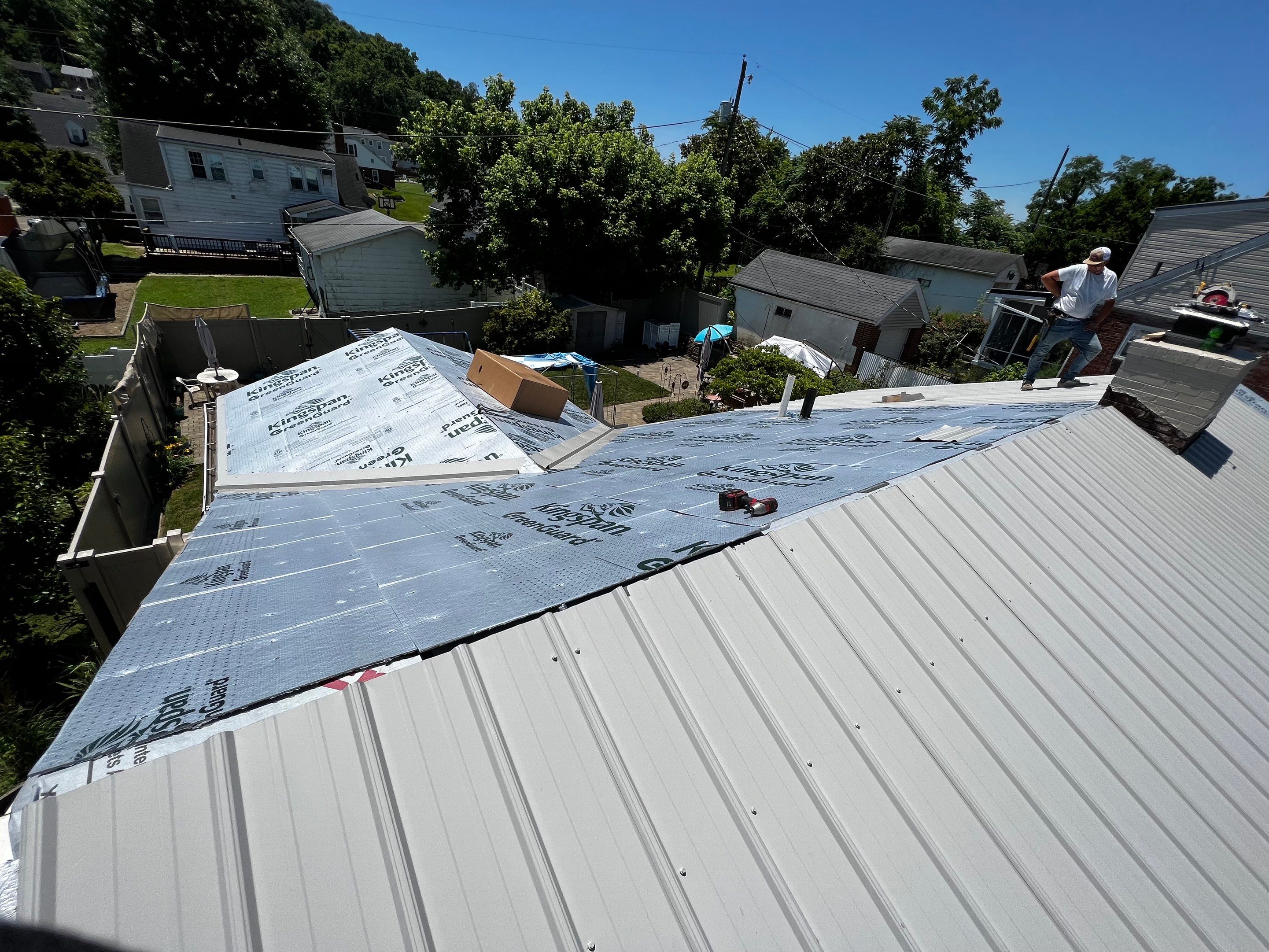 Metal Roofing, Skylights, Porch Build by Secure Construction Company Inc