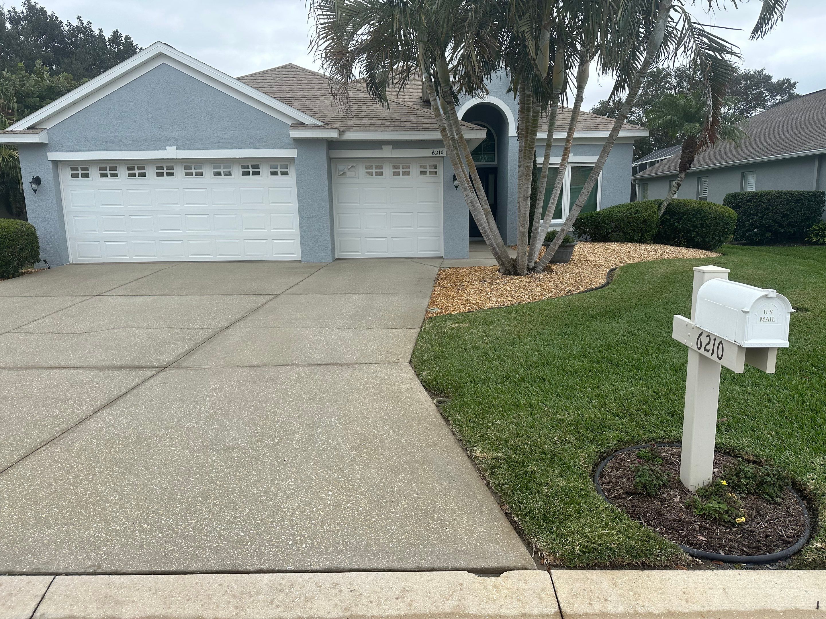 Concrete Driveway, Entryway & Street Curbing Cleaning in Fairways at Imperial Lakes, Palmetto, FL | Sunshine AquaWash by Sunshine AquaWash