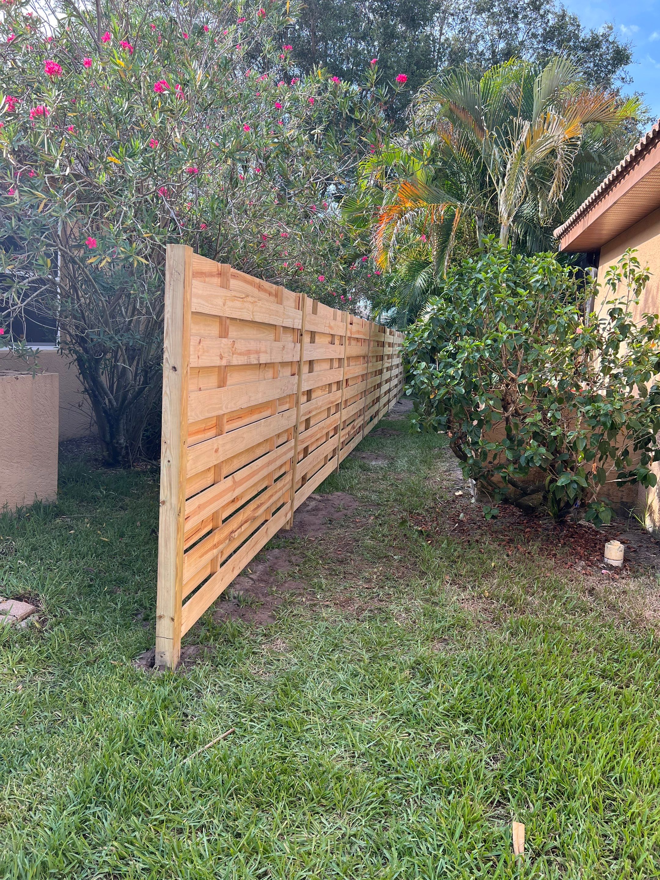 Osprey, FL 6ft. Tall Treated Horizontal Shadowbox Wood Fence by Asap fence and gates, LLC