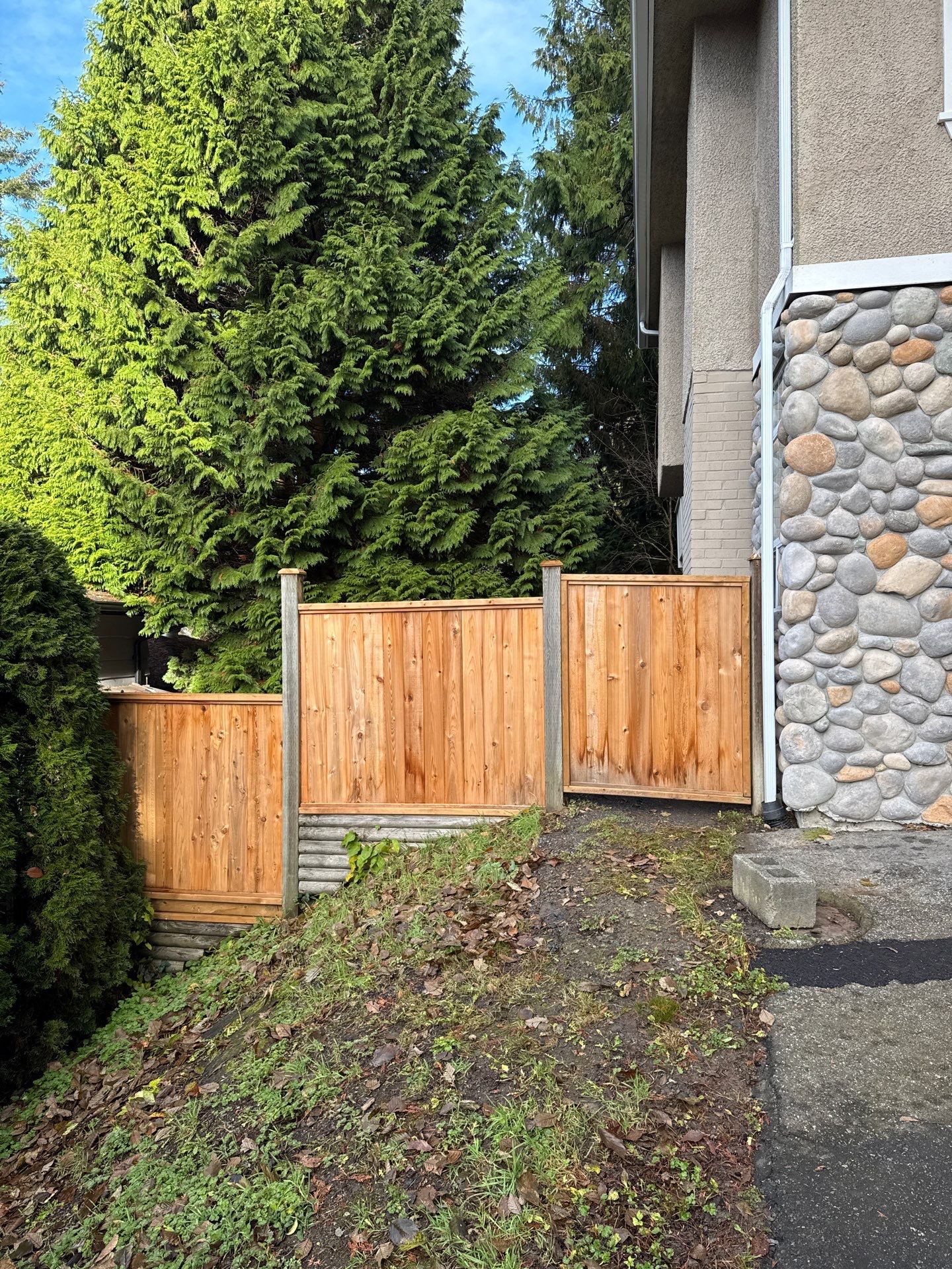 New Fence Installation - Edgemont Village by YVR Construction Group
