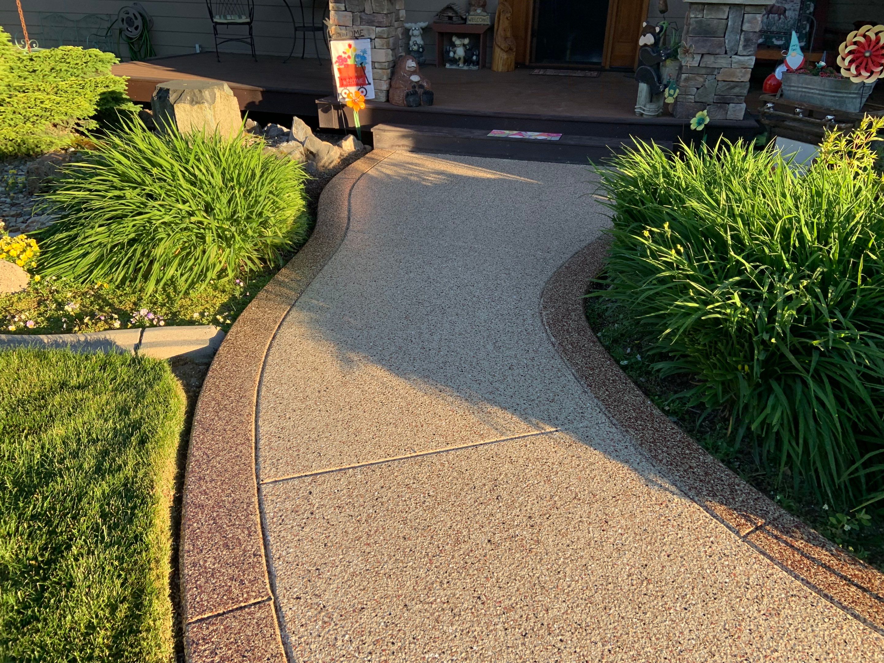 Driveway using Pecan and Chestnut Trim by Croc Coatings, LLC