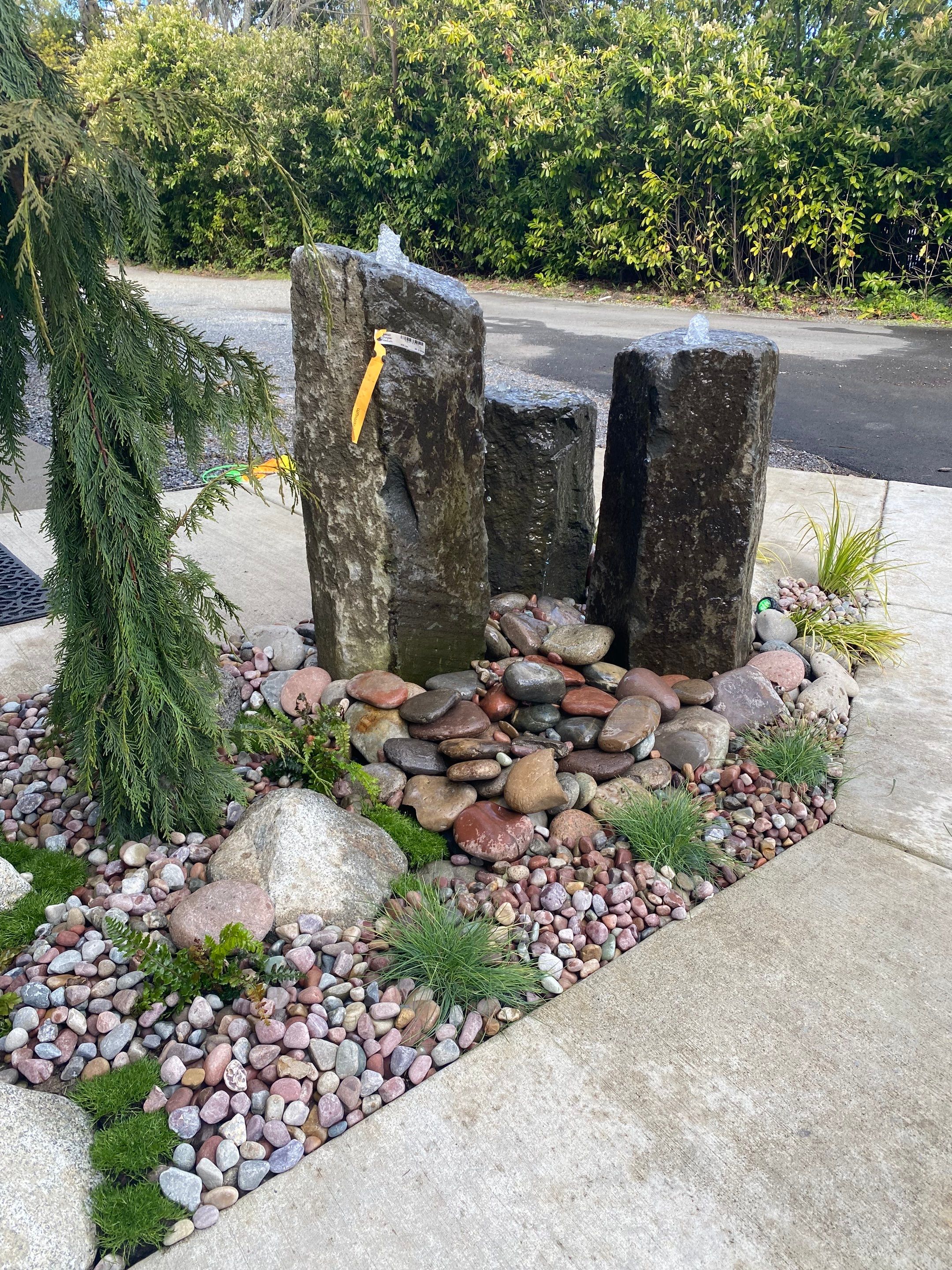 Patio Installation using Concrete, Retaining walls, and Turf install by Jireh Asphalt & Concrete Inc 