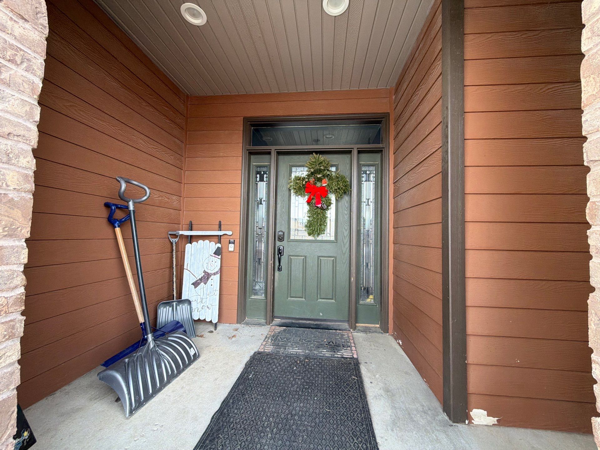 Residential Exterior Painting and Siding Restoration in Crooks by Select Painting, Coatings & Garage Cabinets