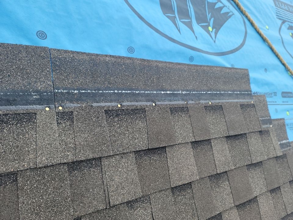 Residential Roofing Installation using Roof Replacement by American Roofing & Construction LLC