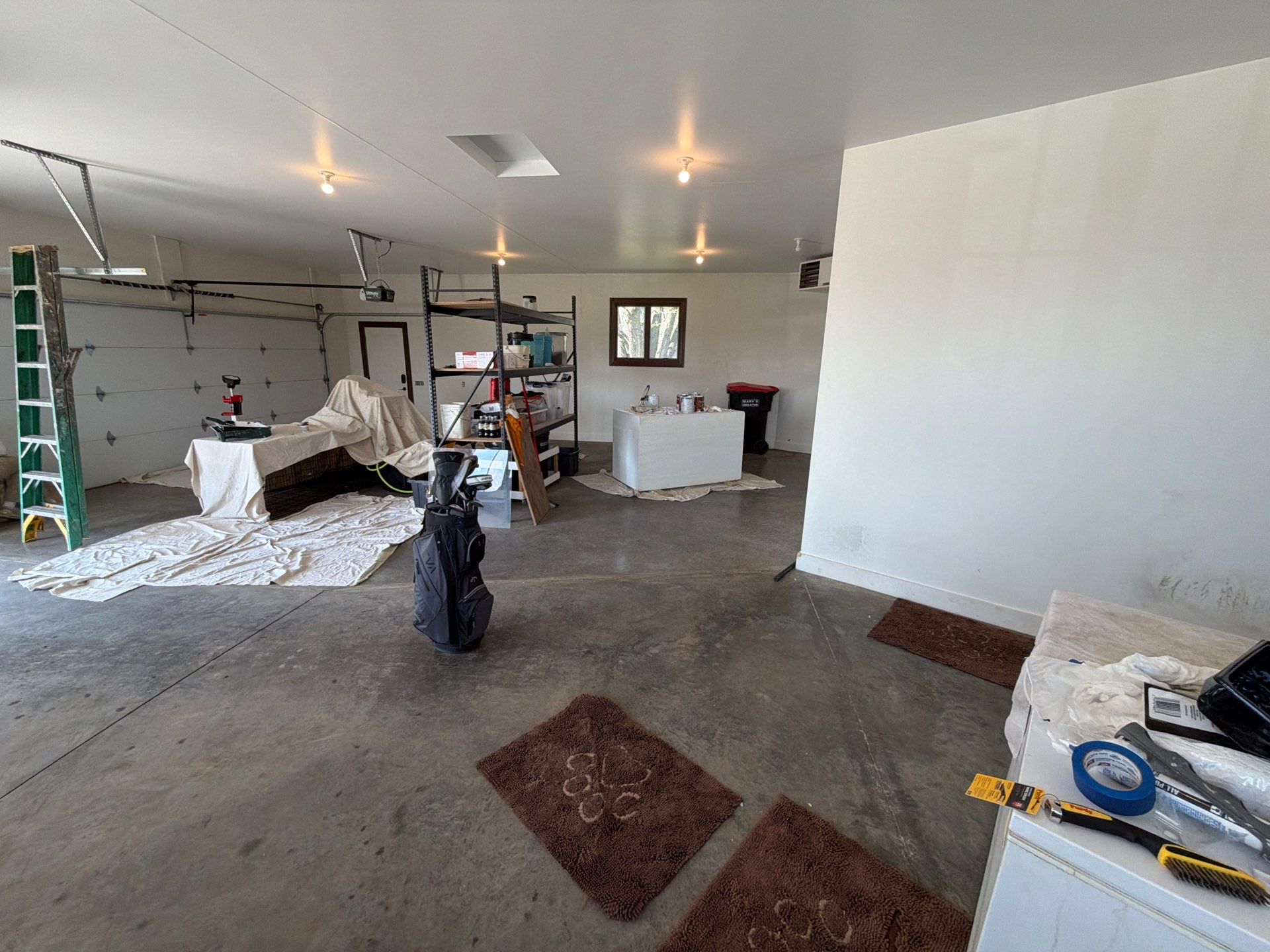Feather Grey Floor Coating in Sioux Falls, SD by Select Painting, Coatings & Garage Cabinets