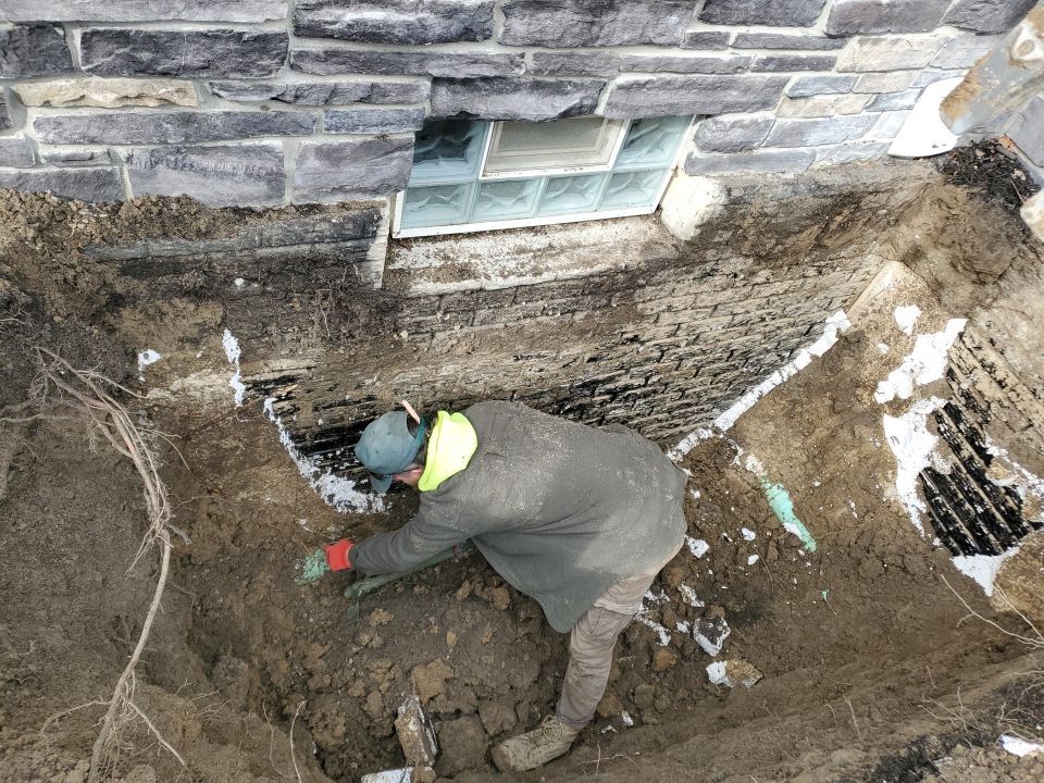 Egress Window Installation using Rockwell Egress Fiberglass Egress Window Well by Toledo Basement Repair 
