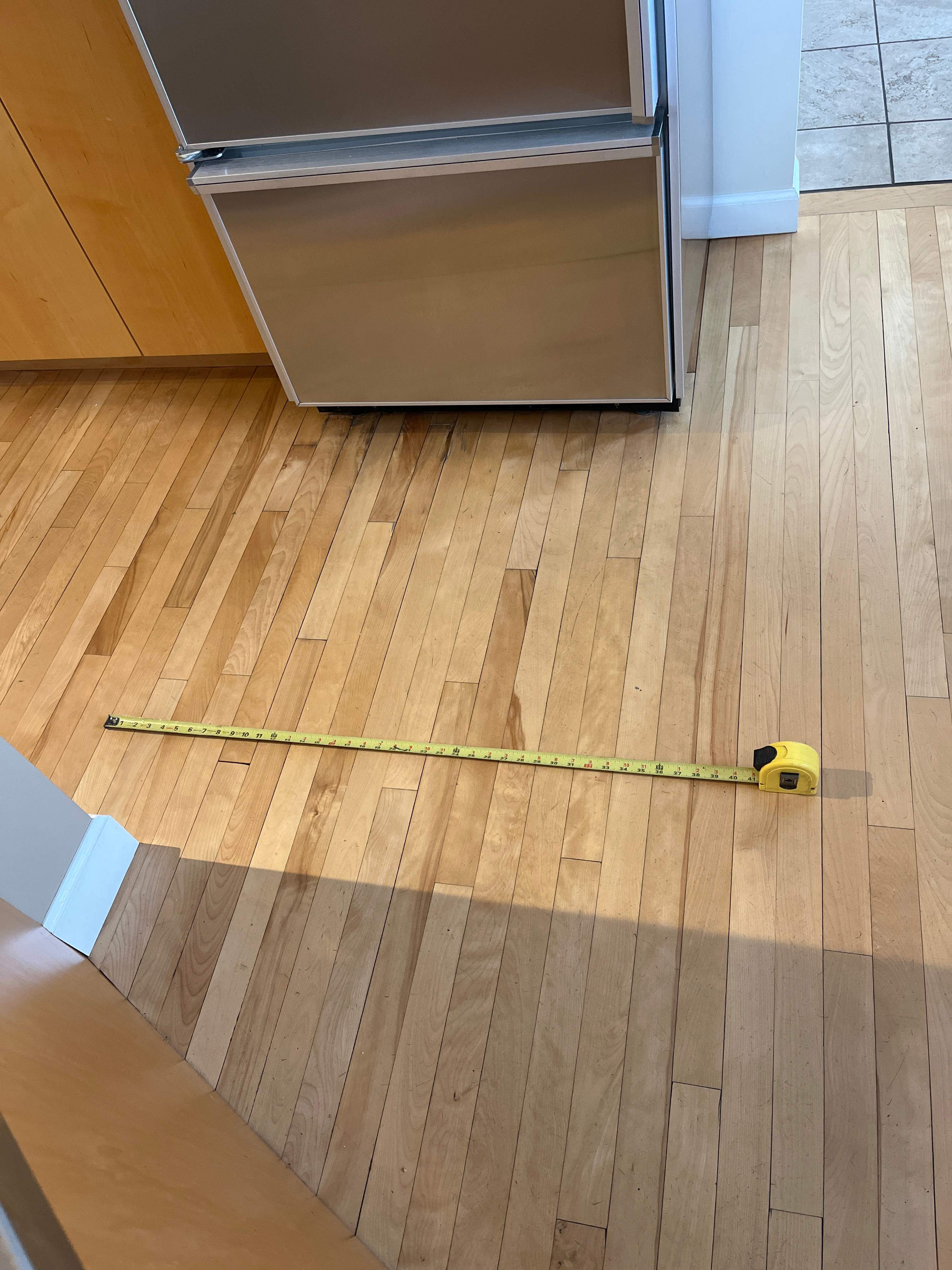 Water Damage Restoration On Solid Birch by RTBaldwin Hardwood Floors