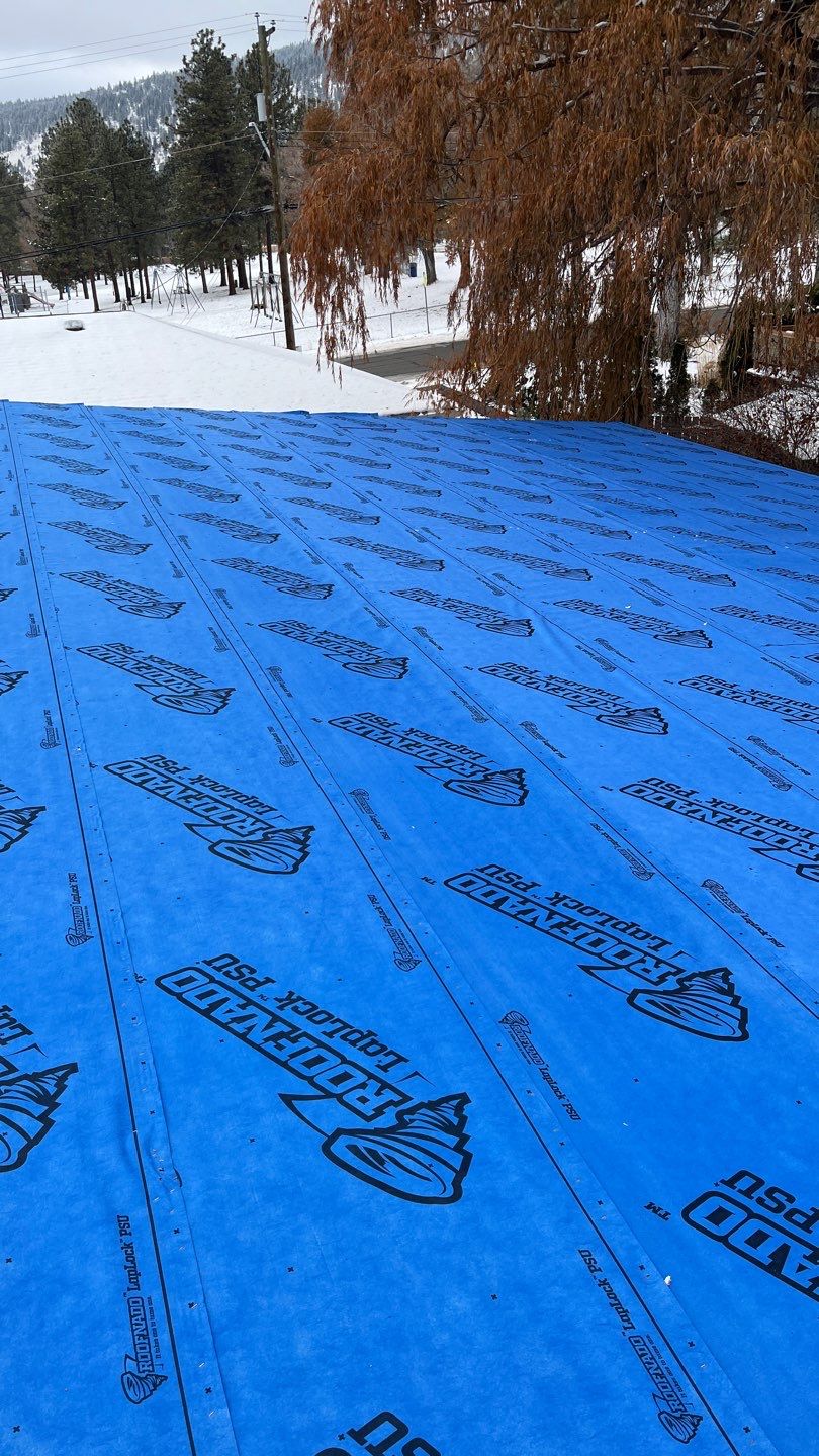 Residential Roofing Installation using 12" Prolok metal  by Top Notch Roofing Inc