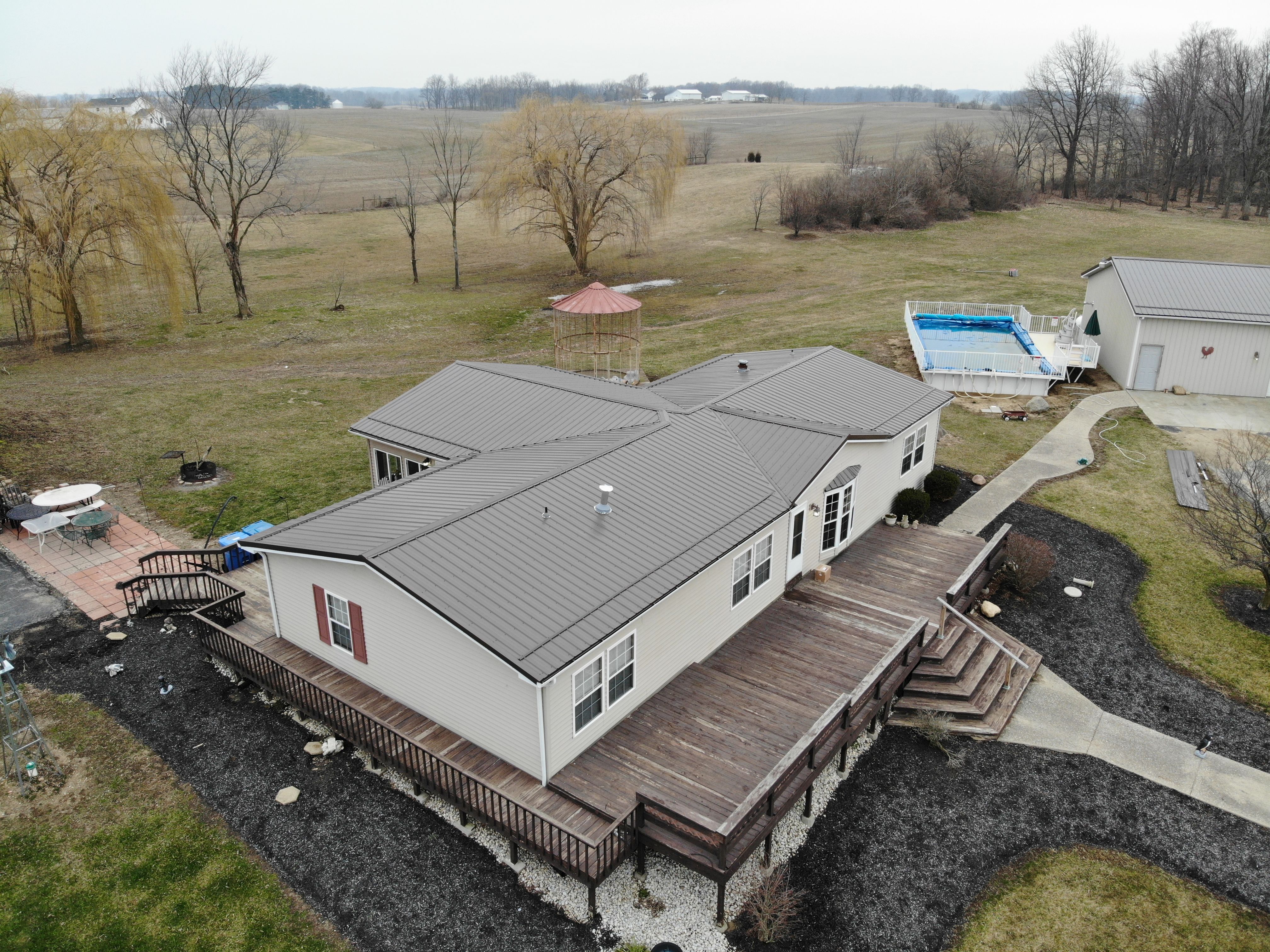 Exposed Fastener Metal Roof on Multi-Home Property in Columbia City, Indiana by 4Ever Metal Roofing