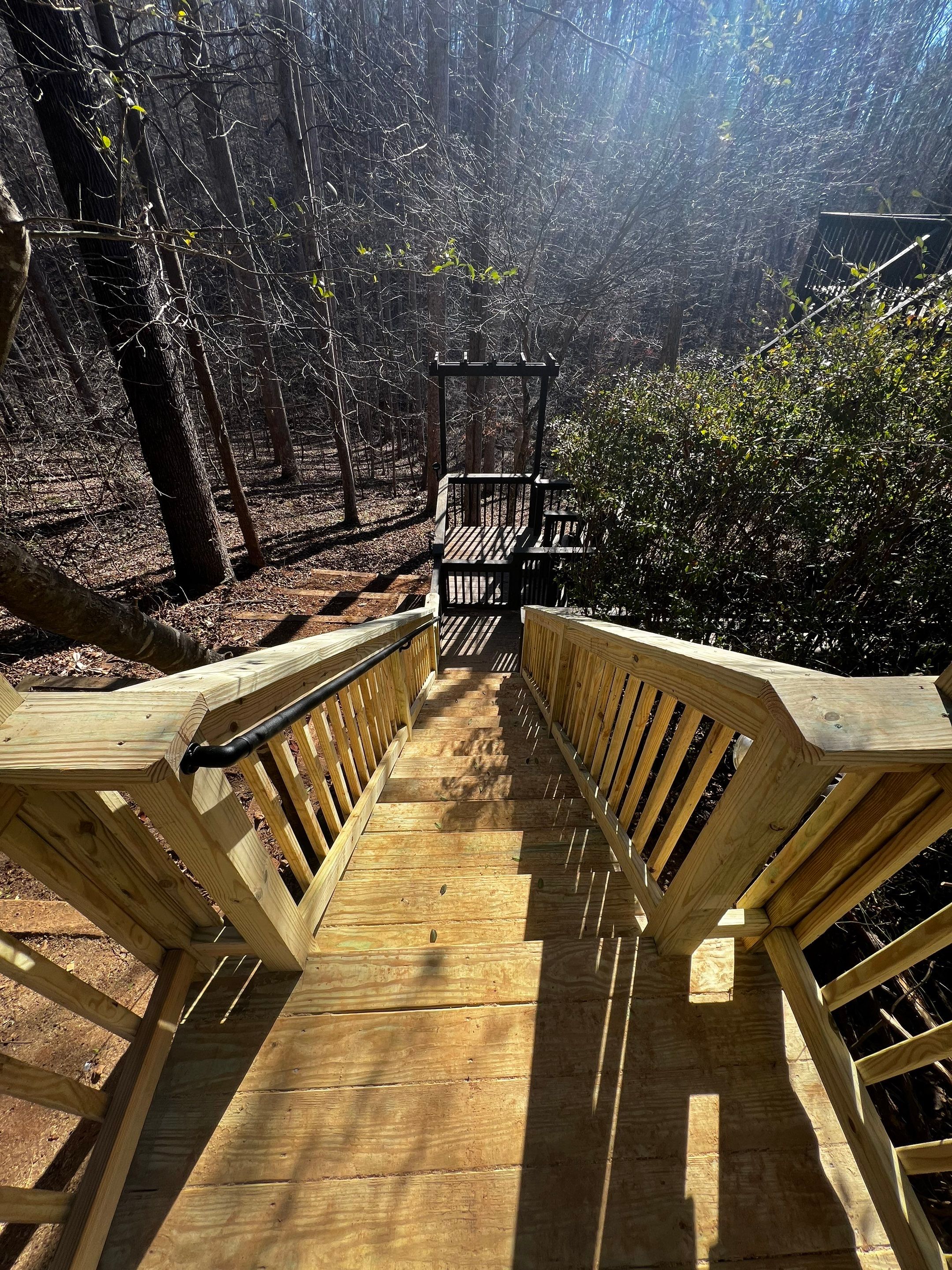 Custom Wooden Hillside Stairway Replacement with Pergola Landing in Canton by Swift Home Renovations
