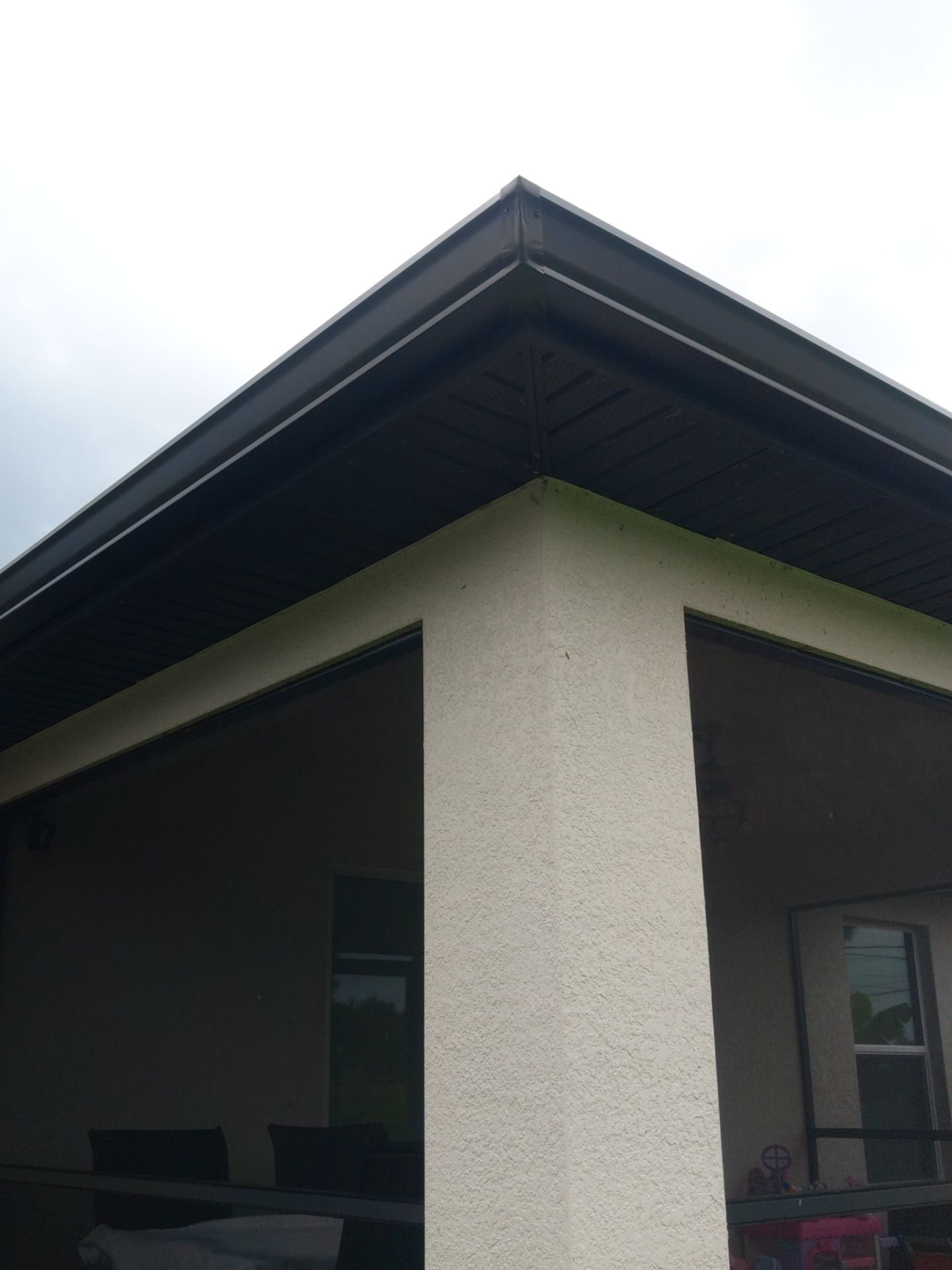 Black Seamless Gutters using black seamless gutters in Cape Coral FL by Gutter Professors