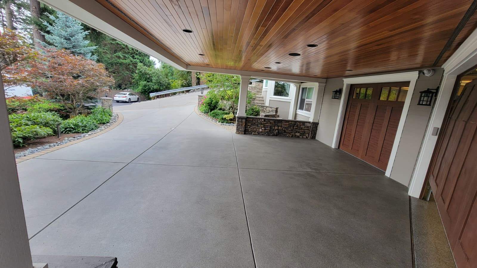 Coastal Grandeur Driveway and Patio in Big Sur Vuba Stone by Concrete Coating Experts Inc.