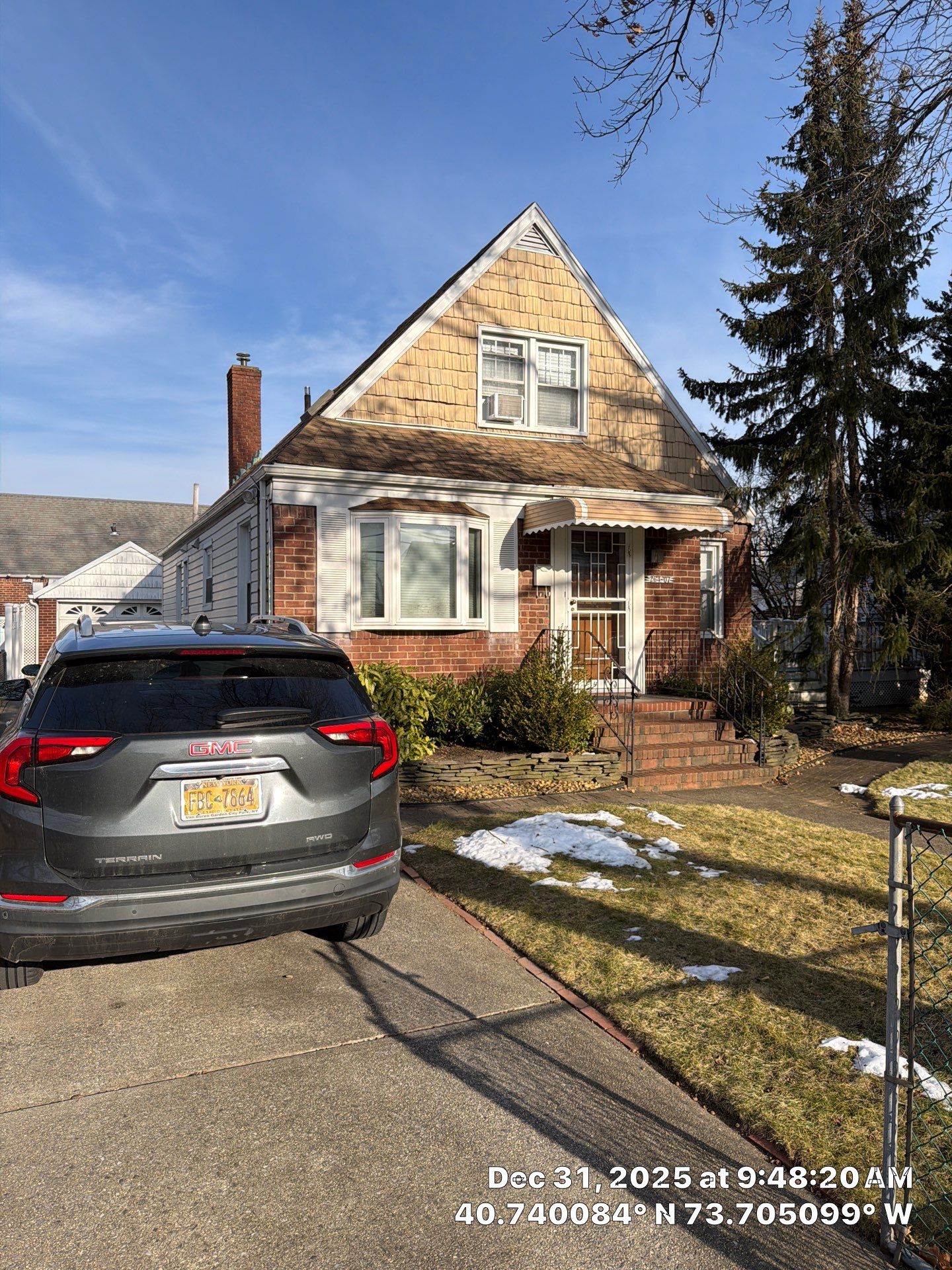 Queens Garage Fascia Rebuild + New 5" Seamless Gutter by Above All Gutters