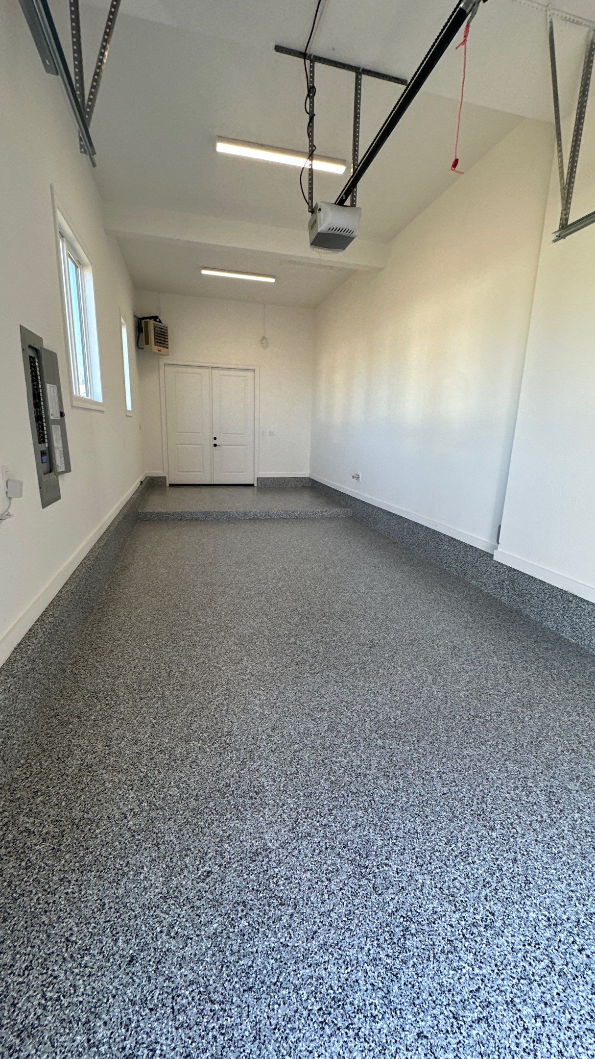Mike & Pam transformed their garage with a Banner Garage Floor and Cabinets by Banner Garage