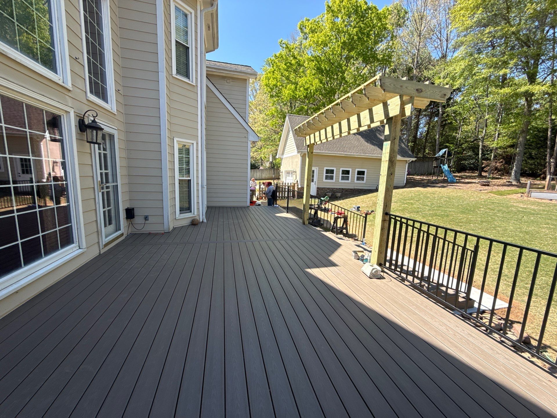 Marietta, GA Deck Replacement using Deckorators Venture Series Decking and Trex Steel Railing by Nelson Exteriors