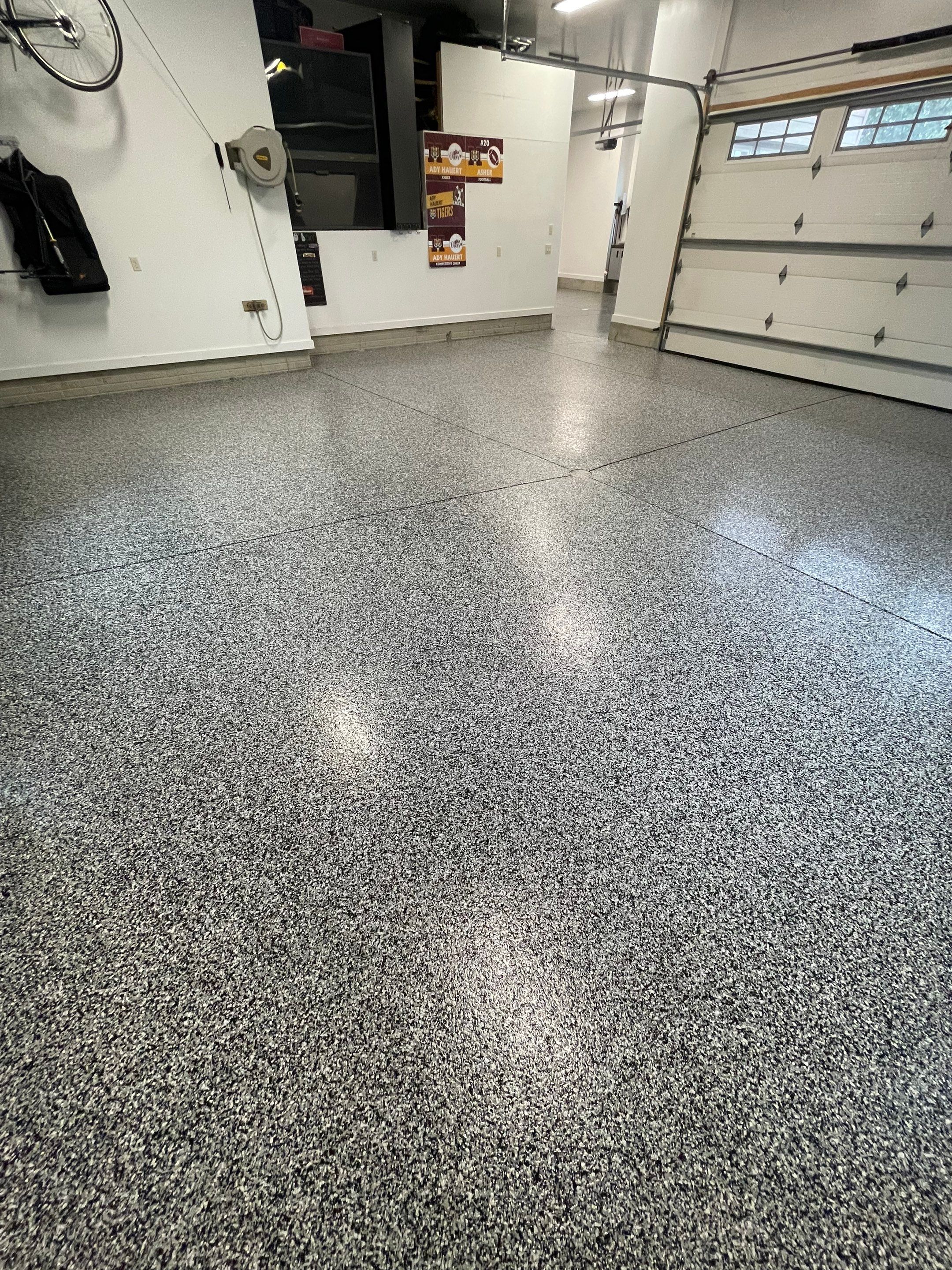 Garage Floor Coating and Domino Flake Finish in Sioux Falls by Select Painting, Coatings & Garage Cabinets