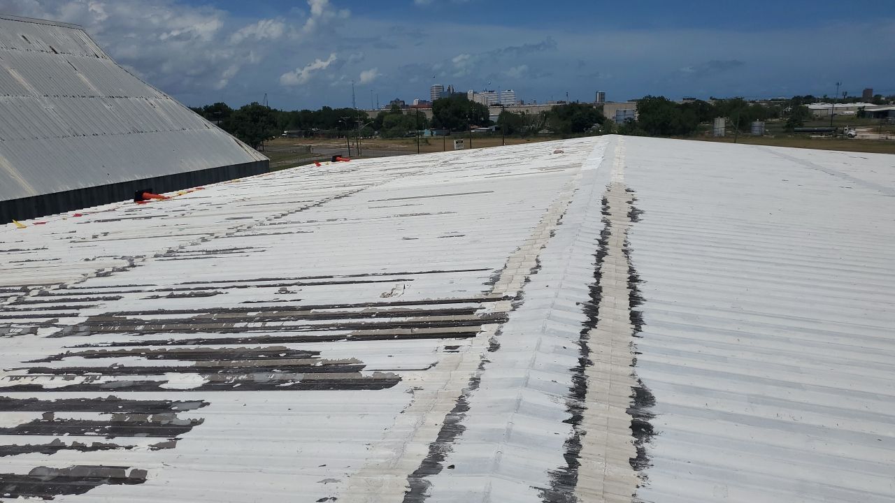 Commercial Roofing Installation using GAF 10 Year Acrylic System by Lighthouse Roofing