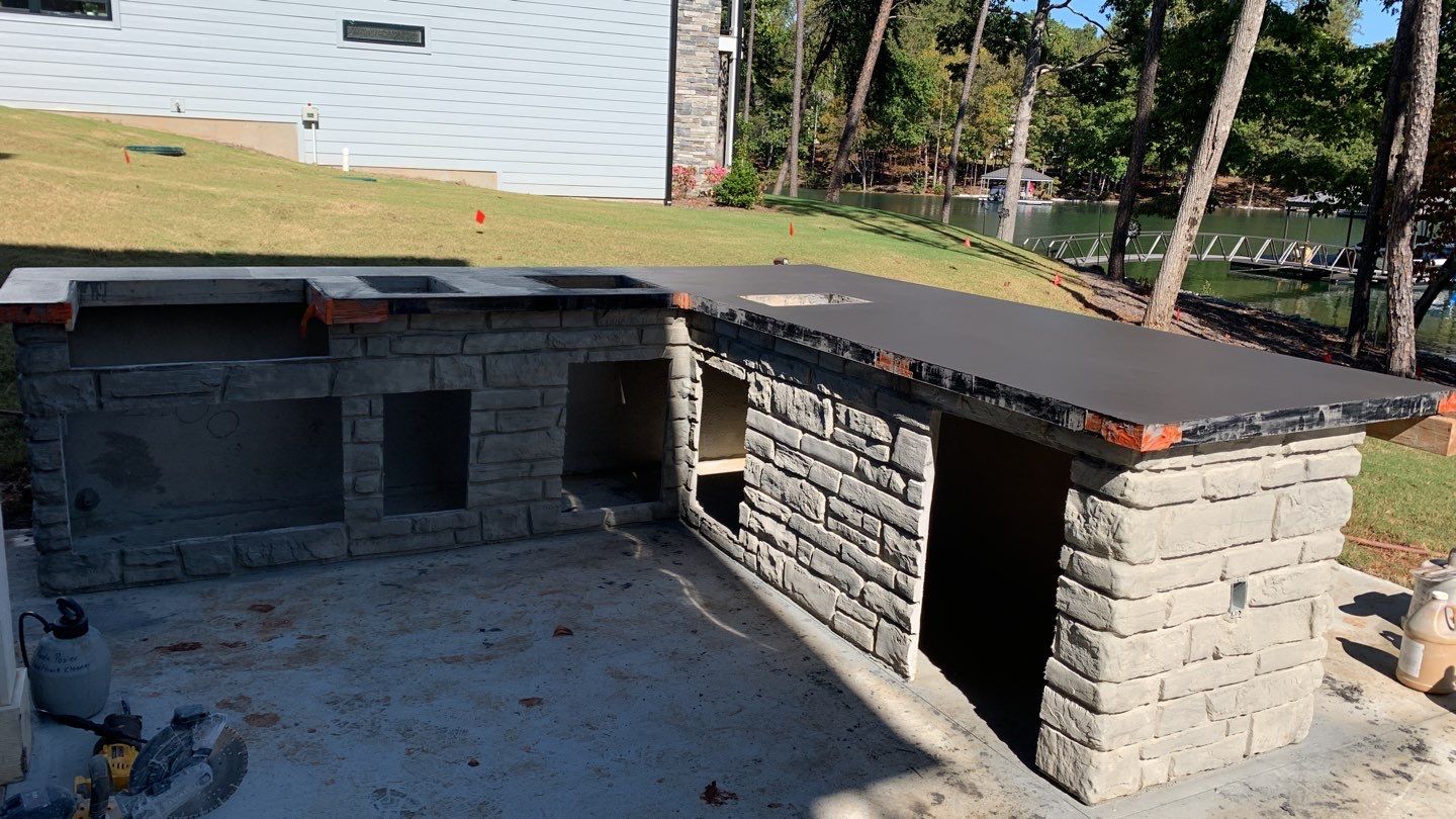 Outdoor Kitchen on Lake Keowee by Xtreme Concrete Services