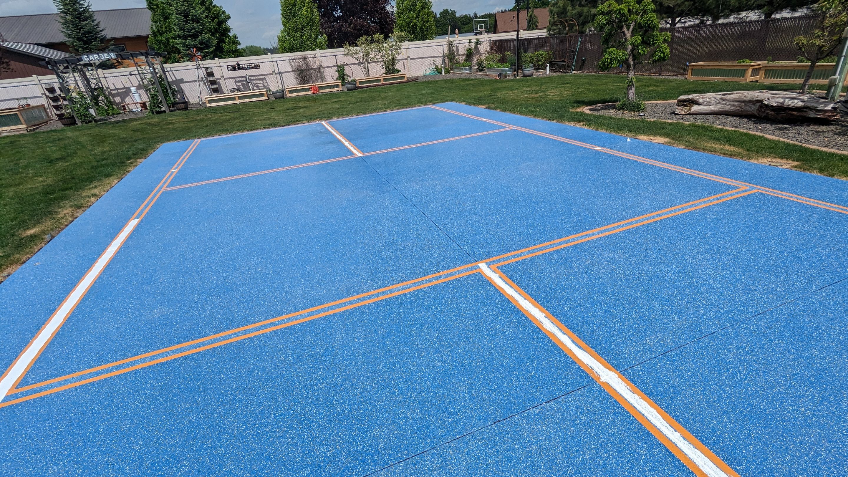 Sports Court Transformation using Ocean Hybrid by Croc Coatings, LLC